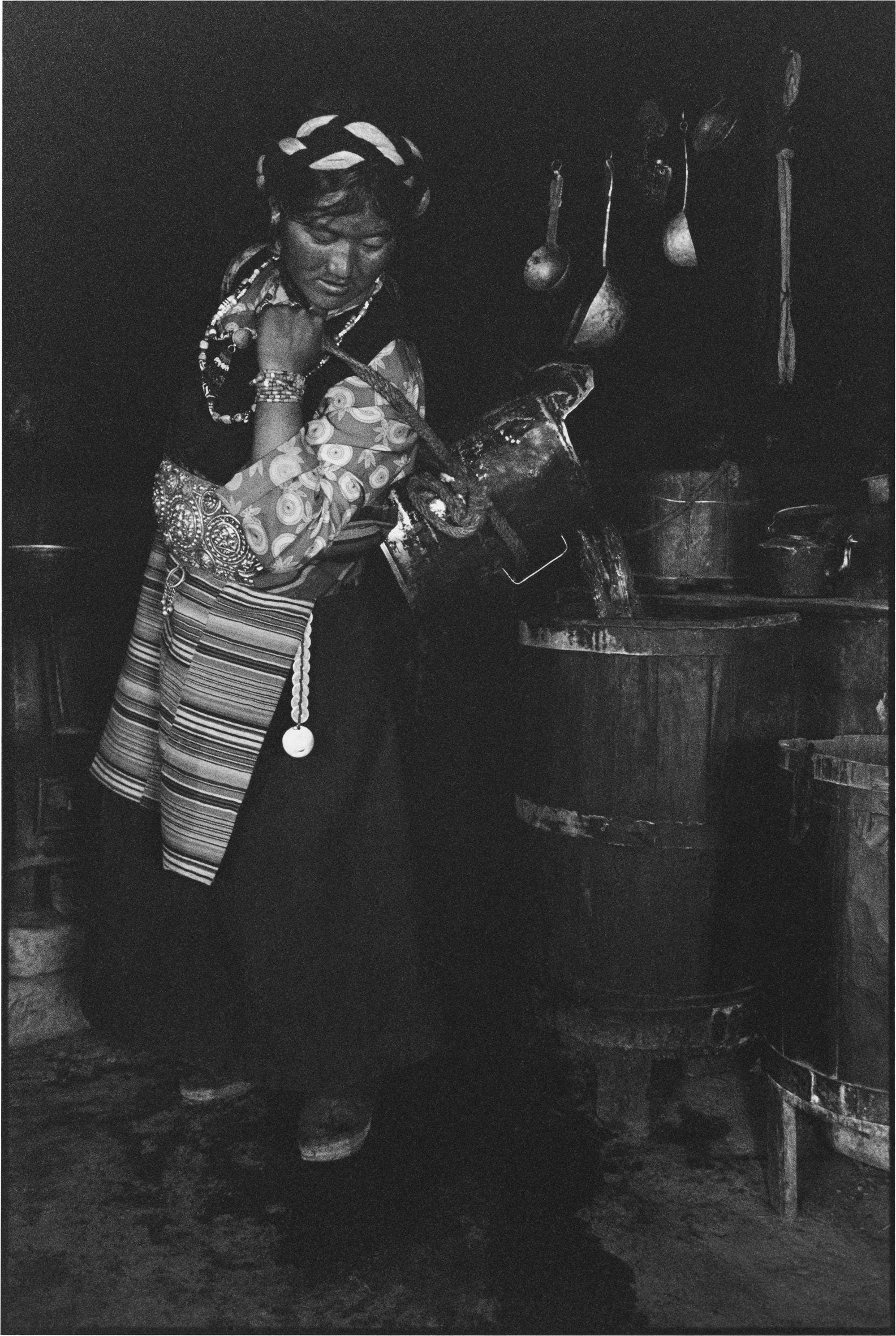 A Woman Pouring Water, Tibet