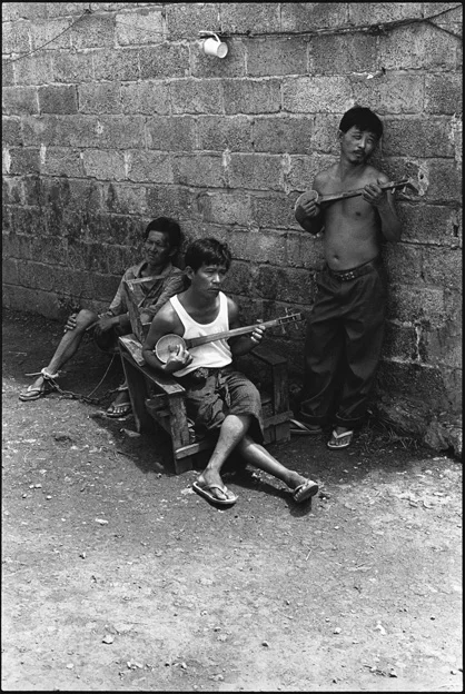 Three Prisoners in the Courtyard