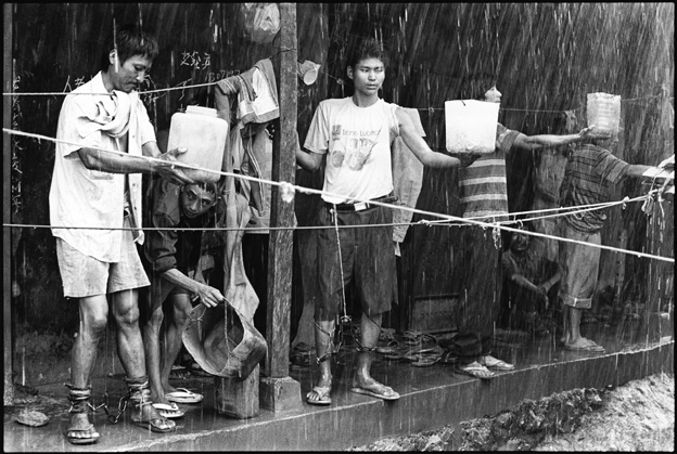 Prisoners Collecting Rain Water