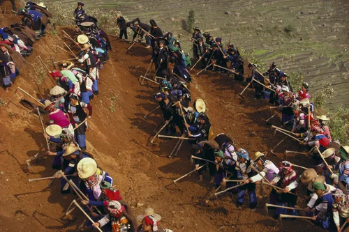 Yi villagers working near Yuanyang, Yunnan Province