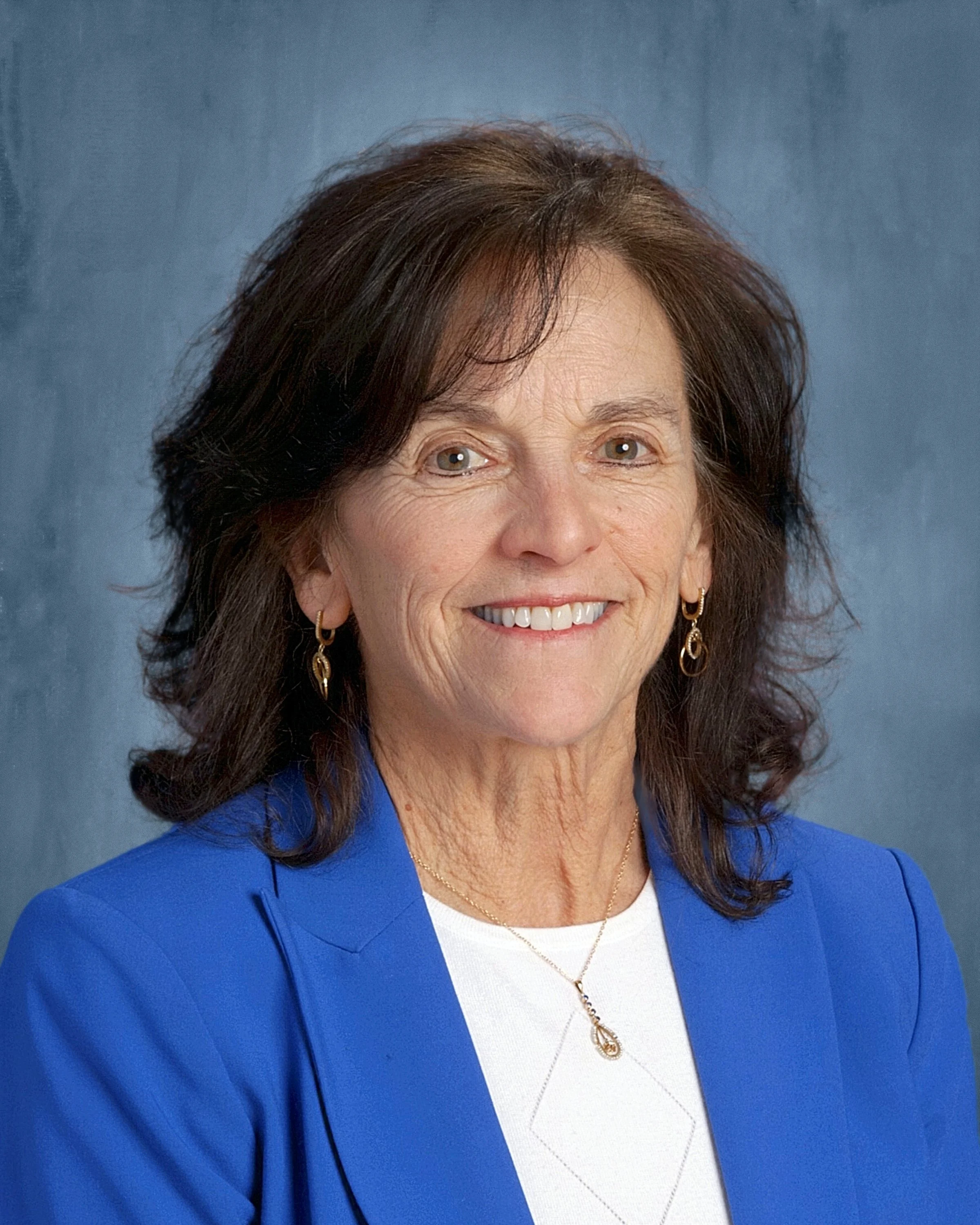 Karen Zandi<br/>President/CEO