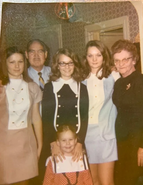 Thelma with husband and grandchildren