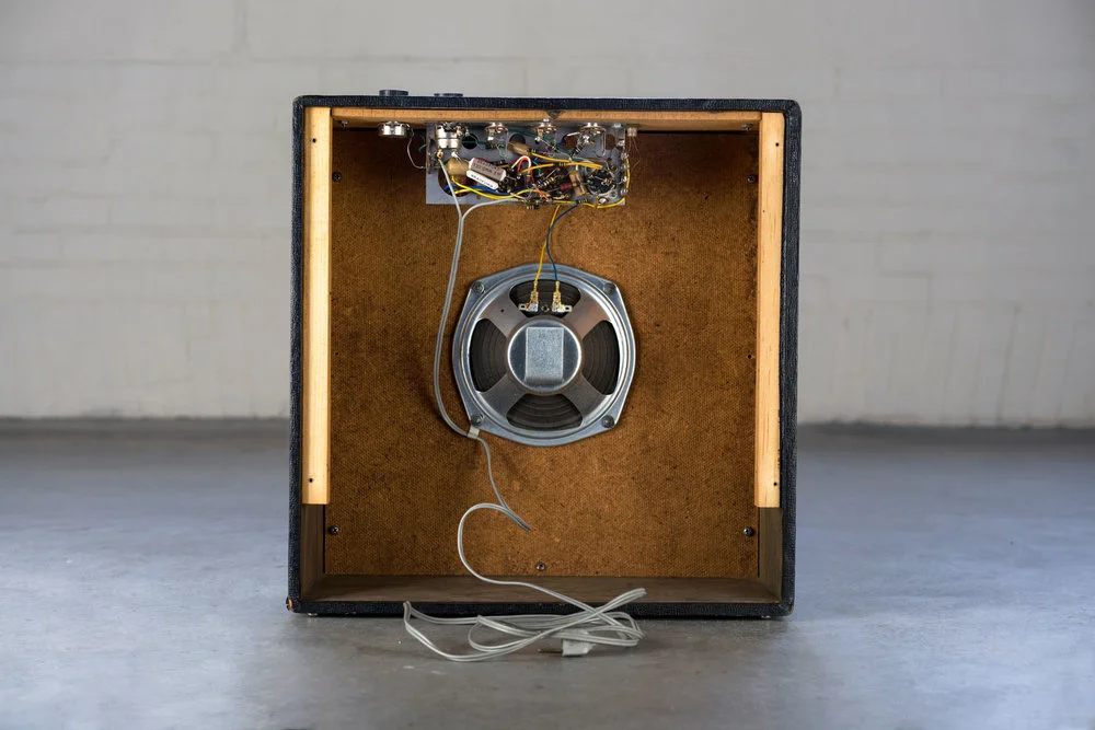 Notice how this Dynavox amp has the two-prong power cord wired directly into the heart of the circuit.