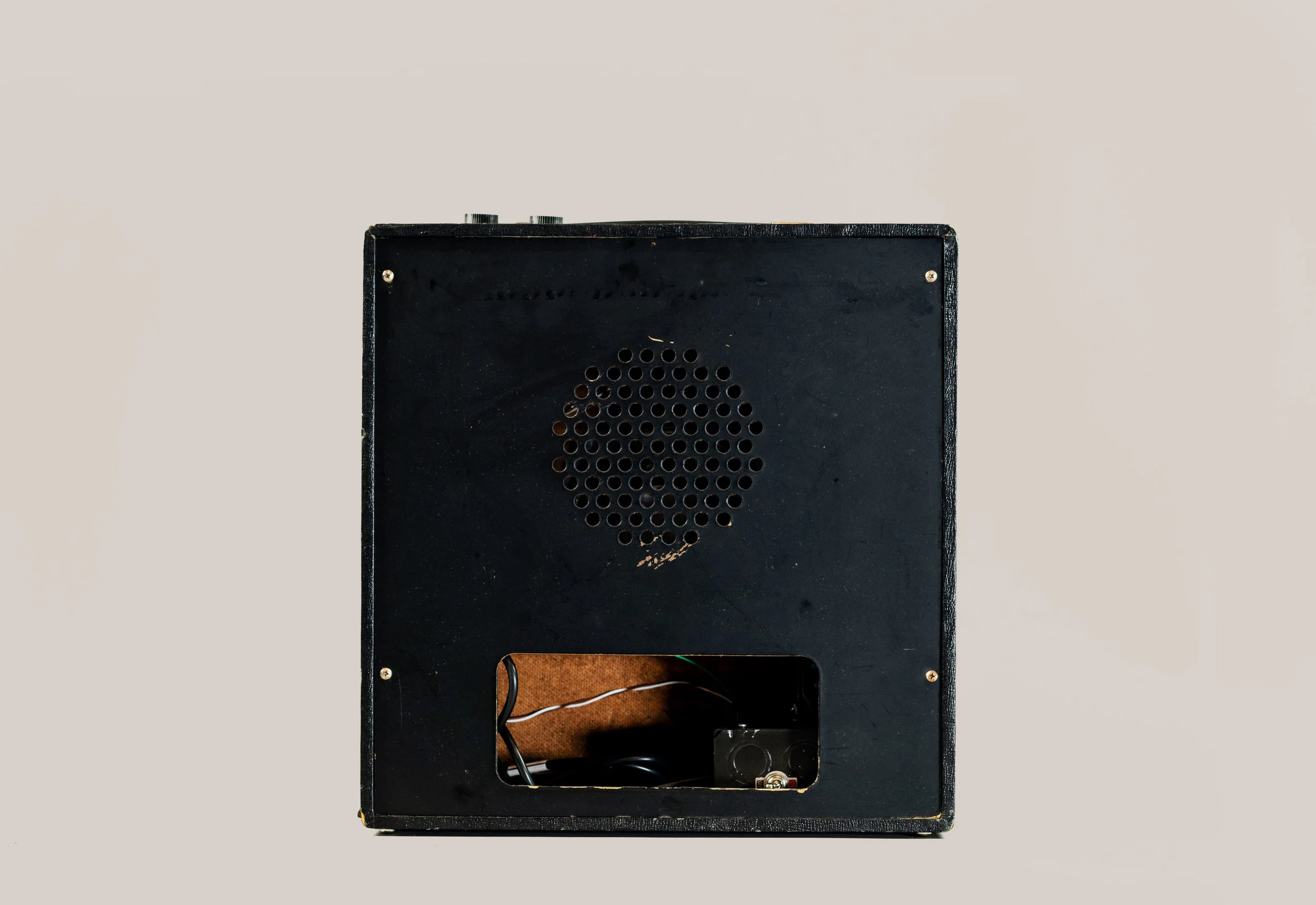 The switch was originally on the volume knob. We moved it to the back, on the power supply chassis.