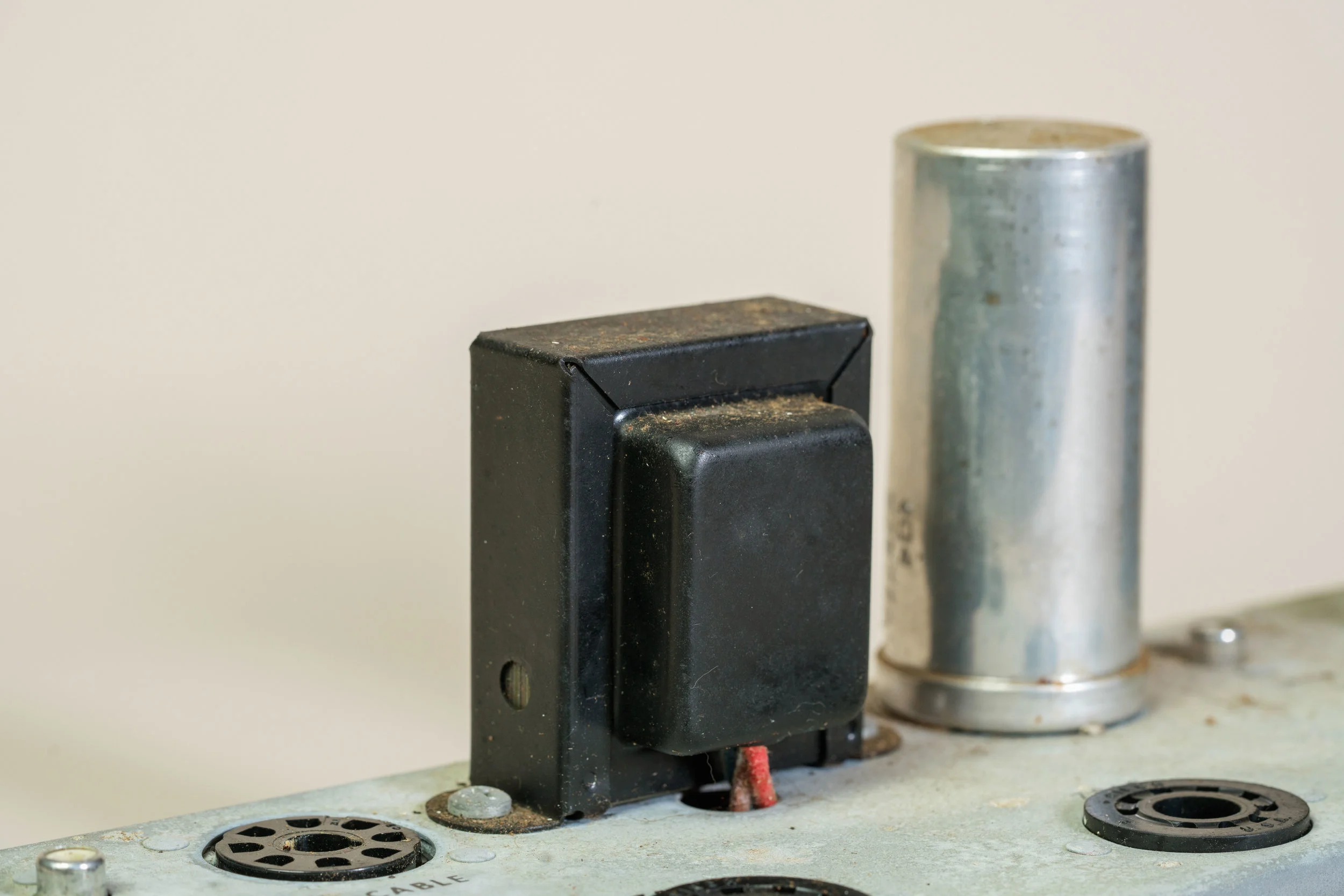 The capacitor can in a Wurlitzer 145 amplifier.