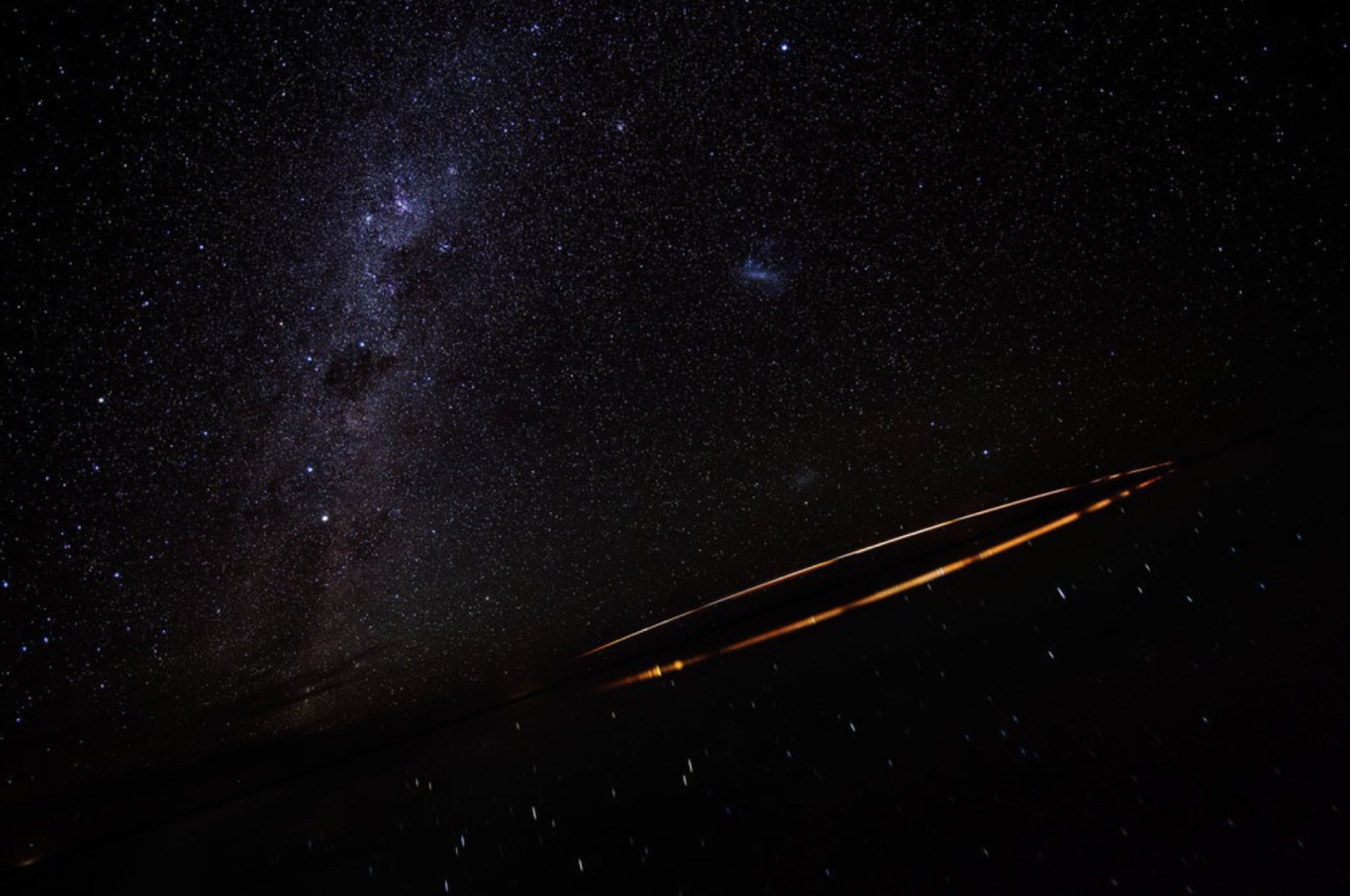 Tomás Saraceno Re-entry , 2016 Inkjet print 107 x 157 x 10 cm (framed) Edition of 6 plus 2 artist's proofs This work depicts a long exposure photograph taken at the salt flats of Uyuni, Bolivia, showing the re-entry of Chinese rocket ‘Long March’, set against the background of the Magellanic clouds 163,000 light years from earth. The flight path of the rocket is reflected in the mirror like surface of the lake.