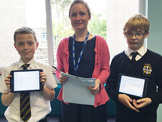 Luke Anderson, Year 7, Miss Humphreys, and Harry Kessell with poems to be read at the LorientInterceltic Festival
