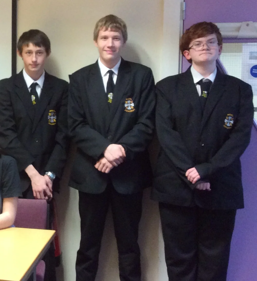 Members of Pool Academy debate team