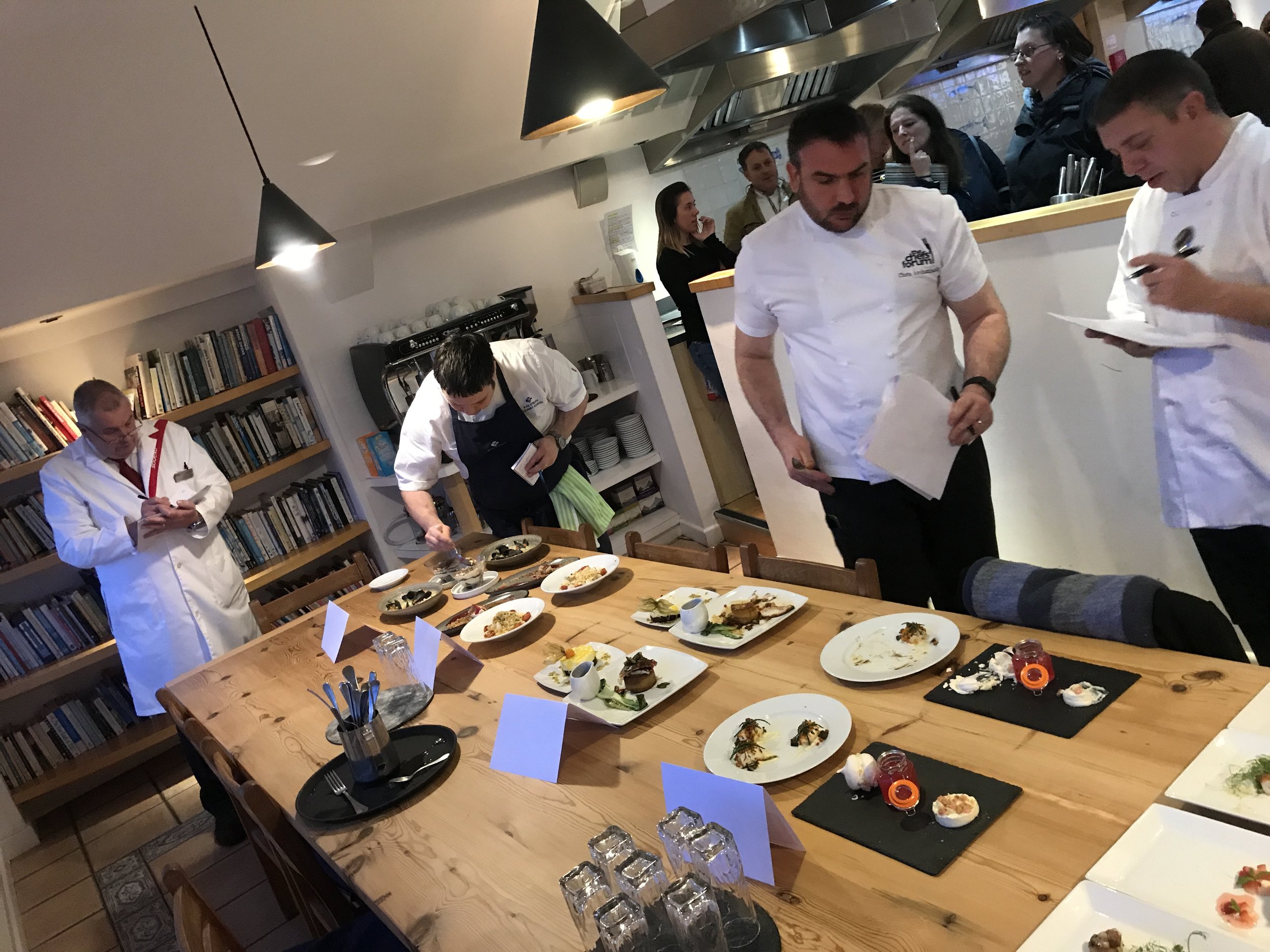 Judges tasting the competitors creations.