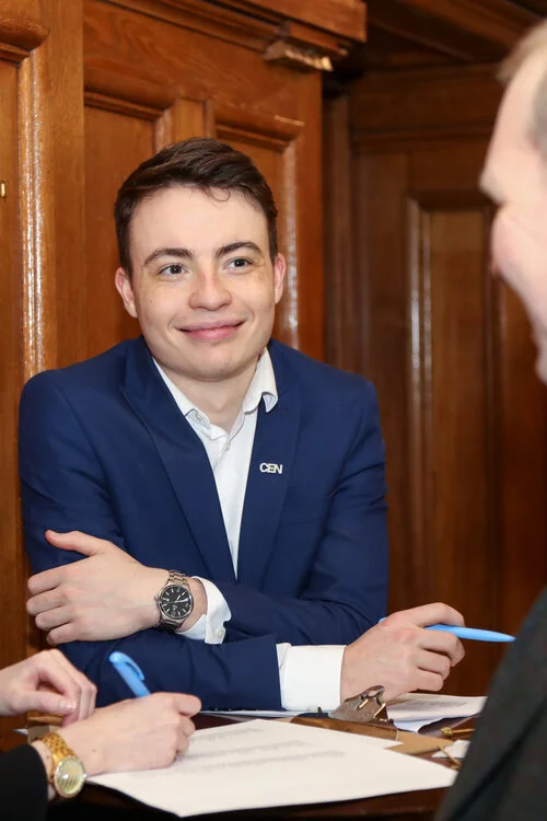 Former student works with MPs