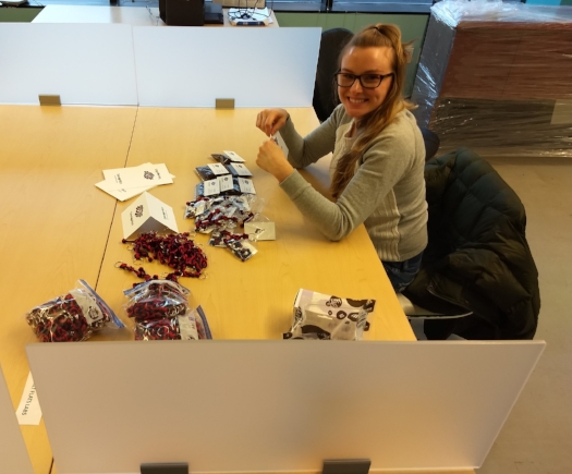 Tara making M&M swag bags to join our custom made "knot logo" key chains and Cooper's Coffee Co. promo coffee satchels! YUM!