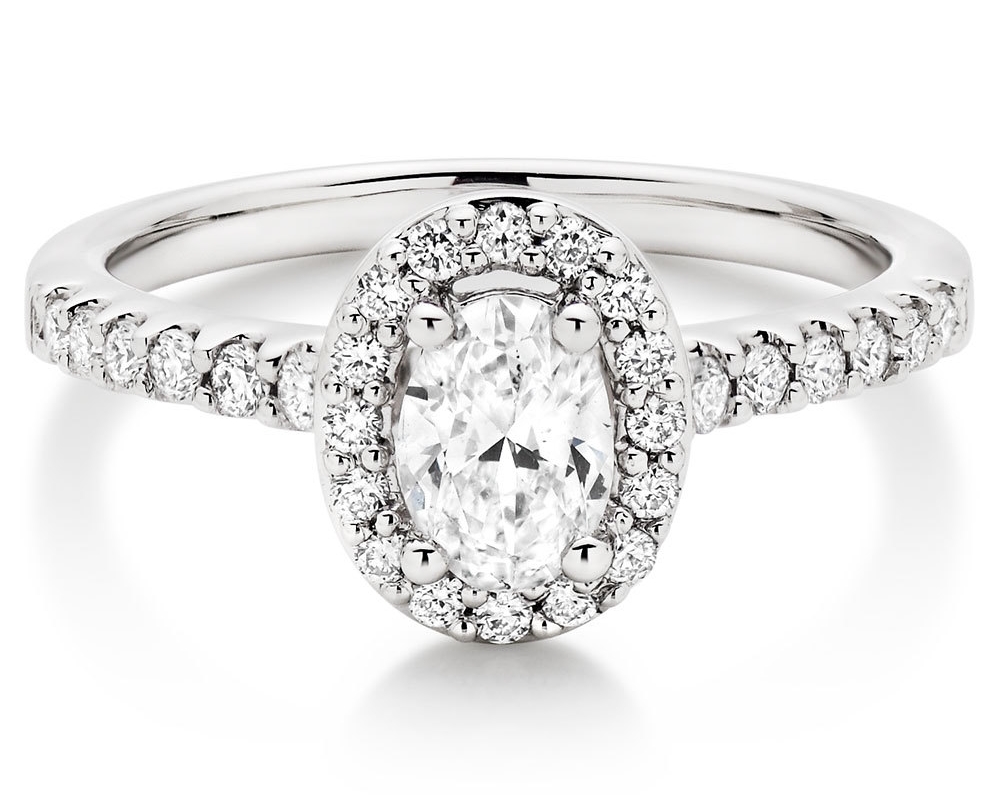 The ultimate in vintage glamour, our Platinum Diamond Halo Ring will take your breath away.