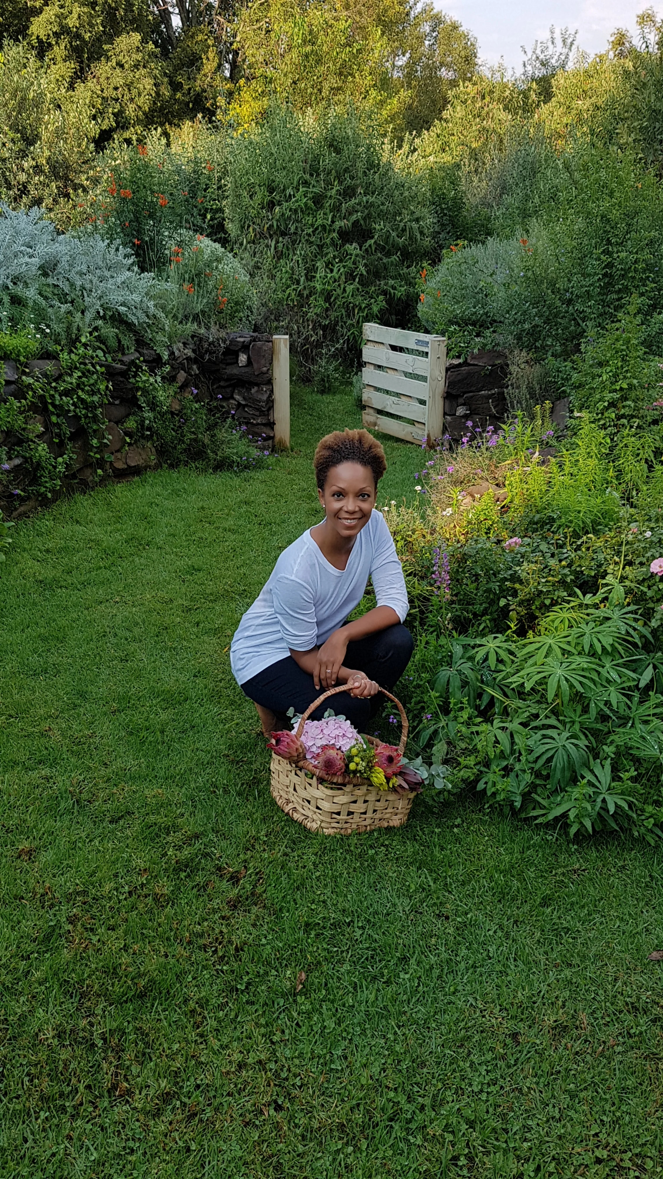 In my aromatic garden, picking flowers, herbs and spices...