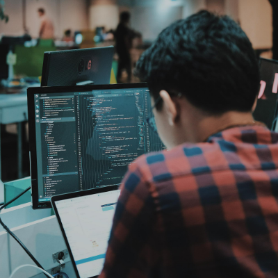 Male Offshore WordPress Developer Writing Code