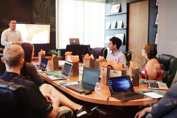 Outsourced Web Design Team Having a Meeting