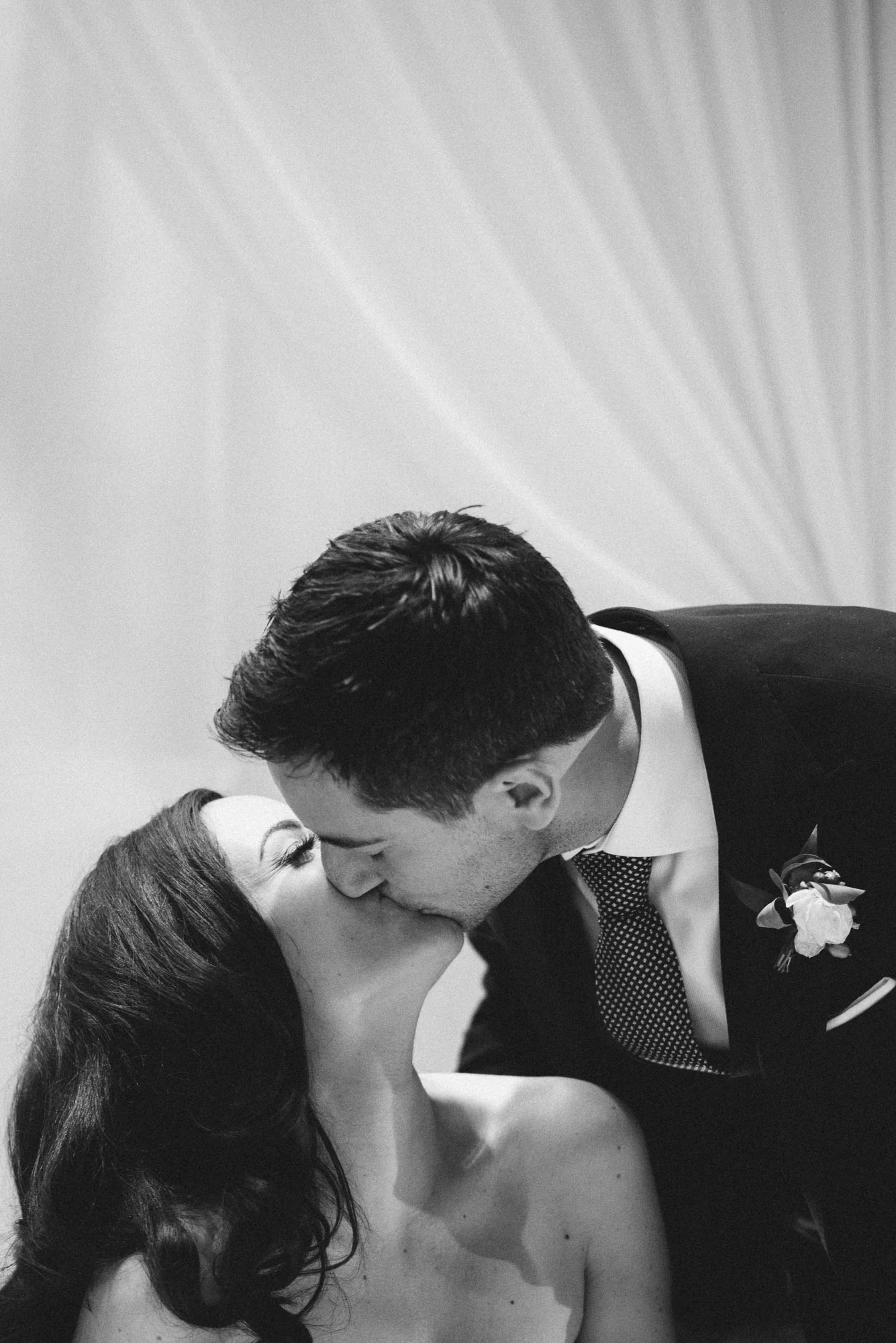 Bride and Groom kiss at reception