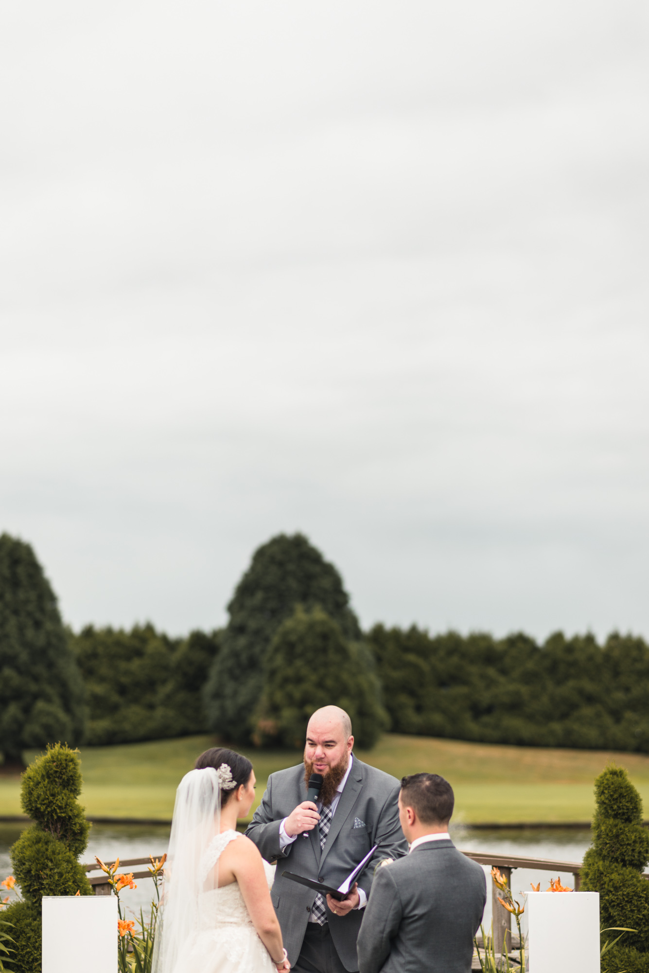 Pastor with Bride and Groom