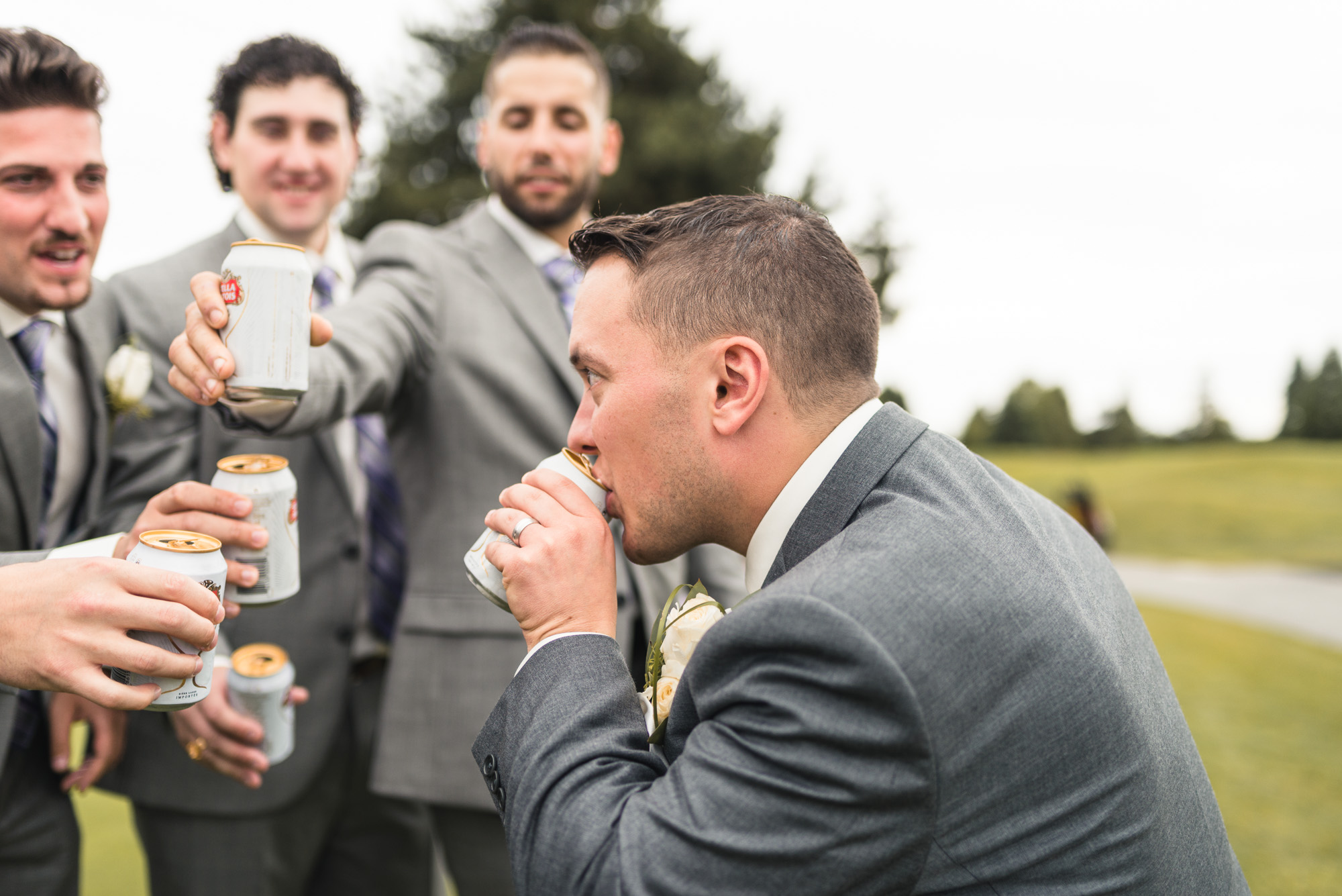 Groomsmen drinking beer