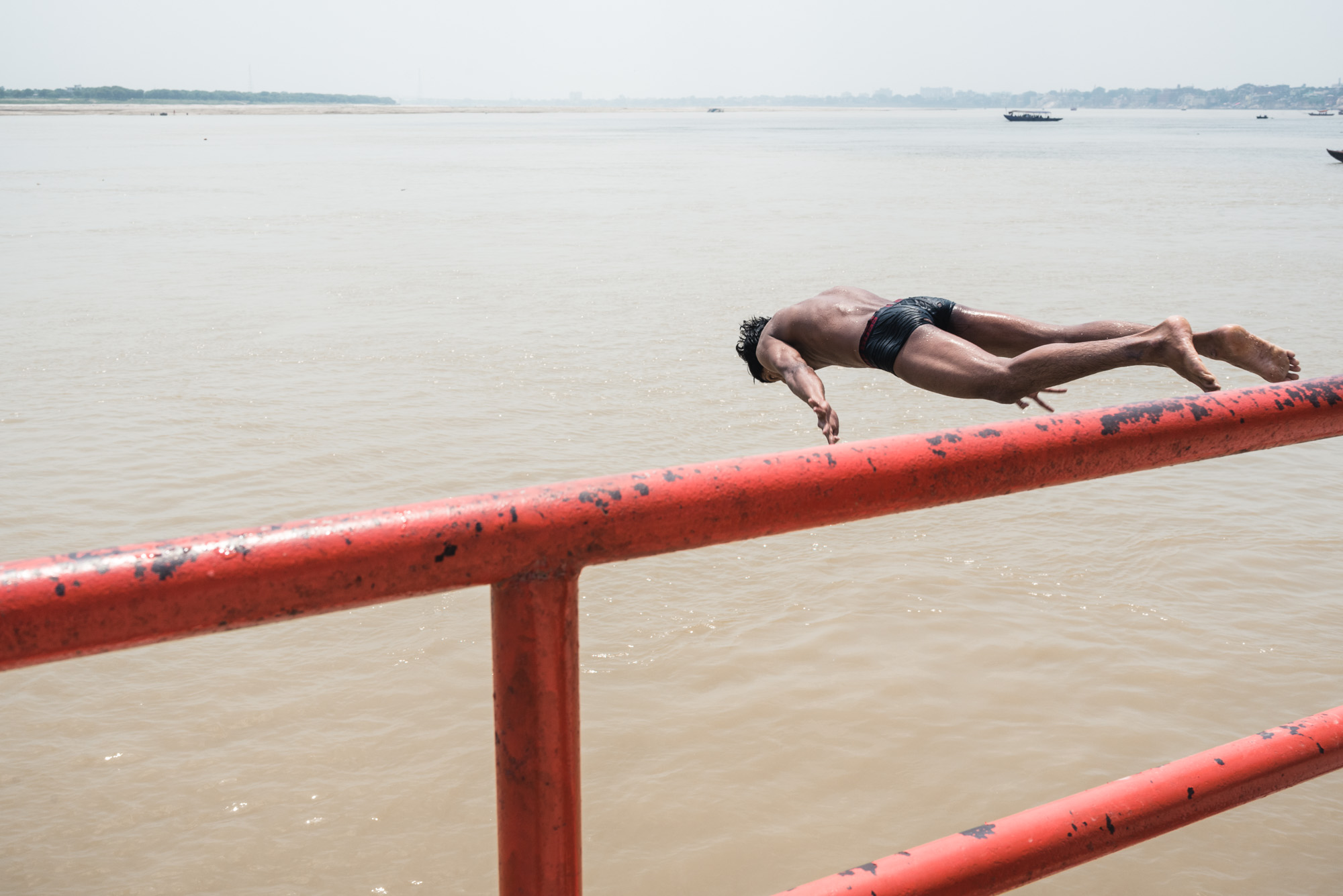 Boys jumping into the Ganges in Varanasi