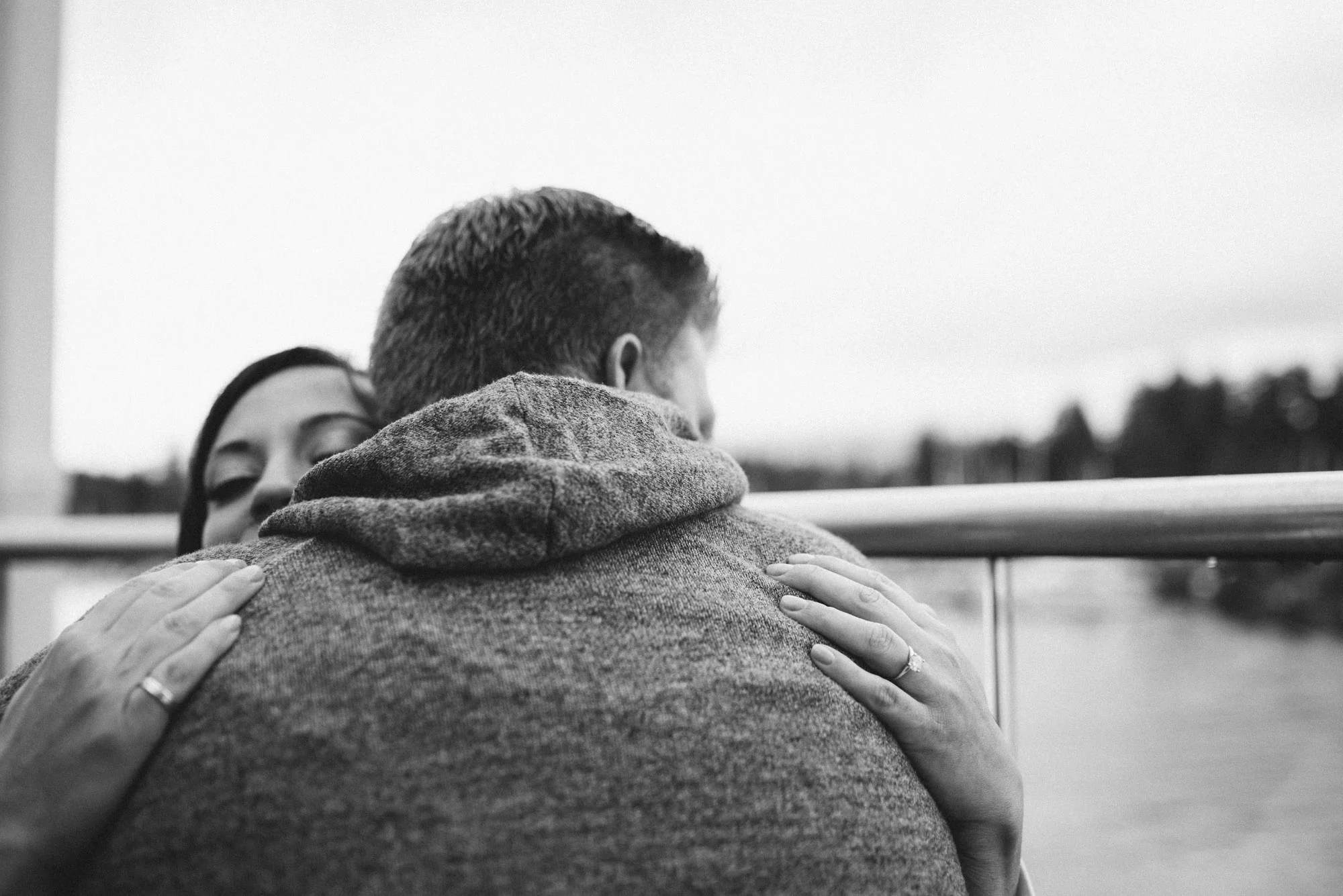 Couple hug on patio