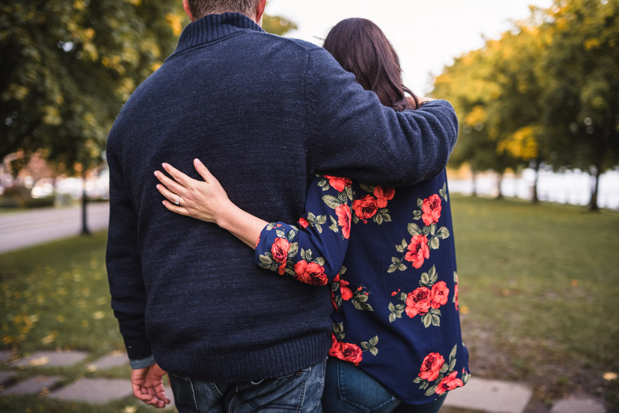 Couple hugs in park