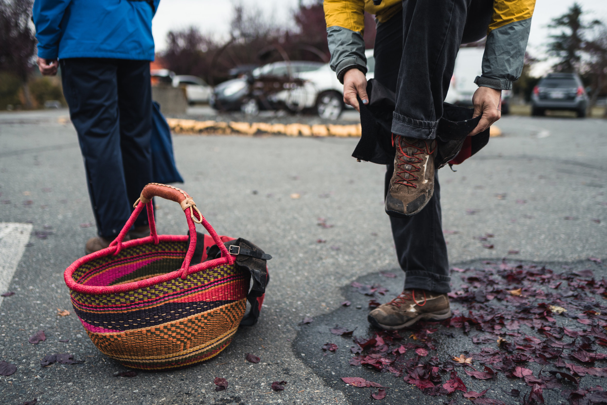 Man puts on gaiters