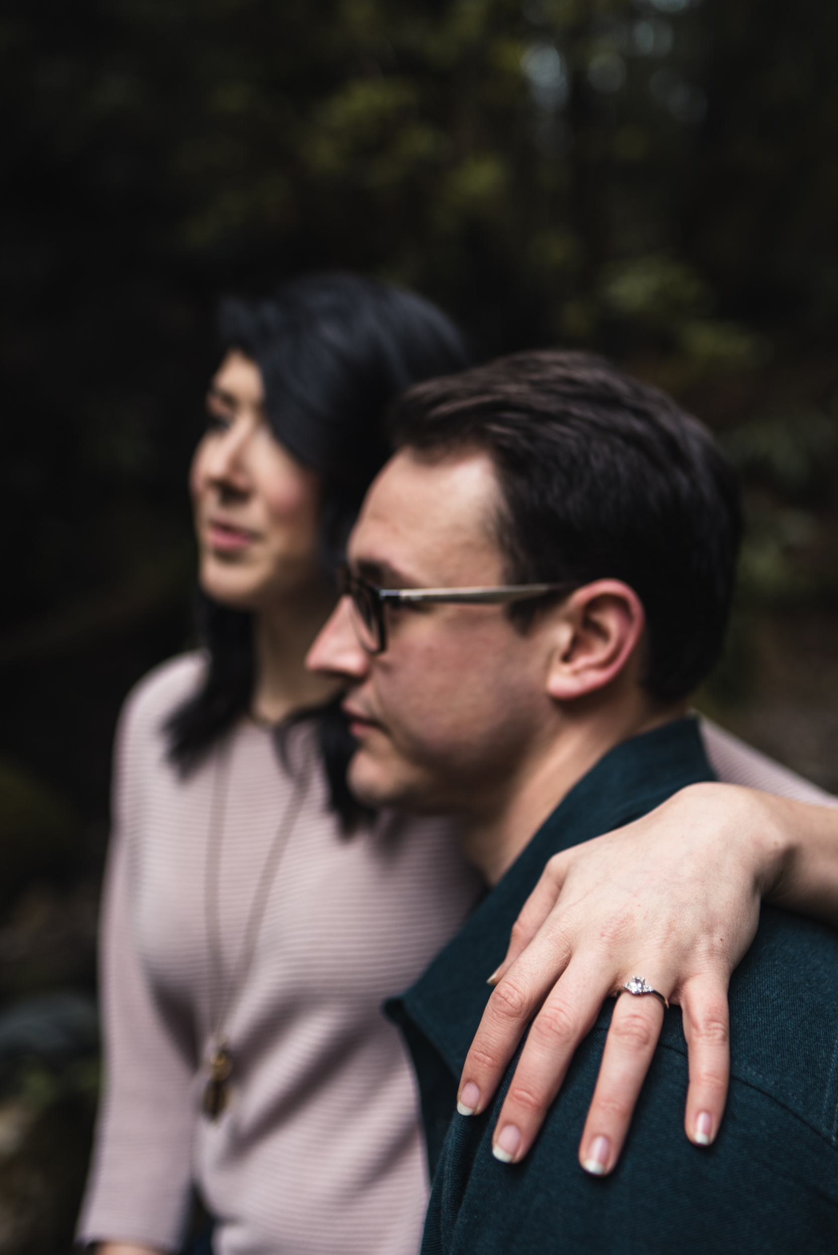 Couple smiling in forest