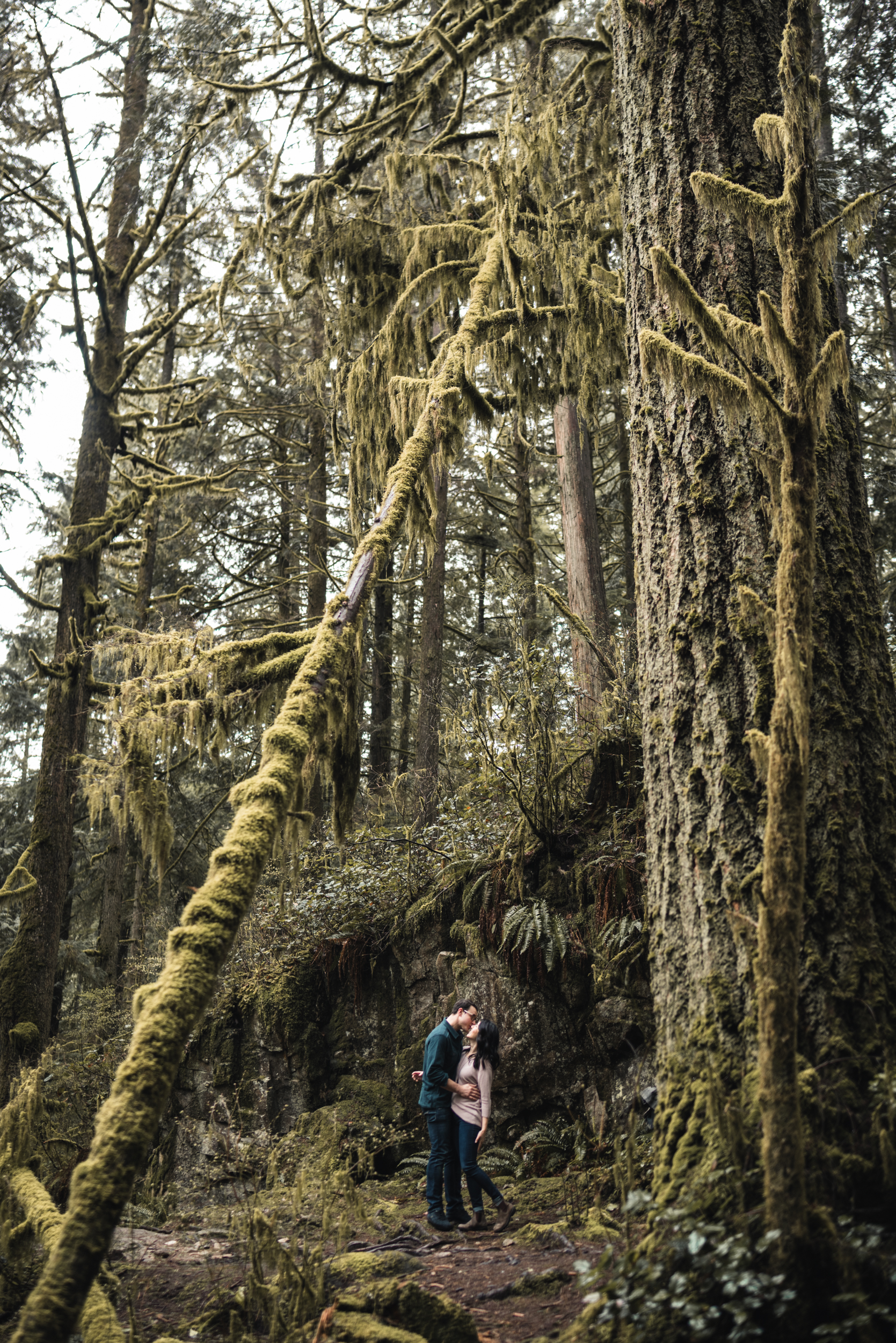 Couple kissing in forest