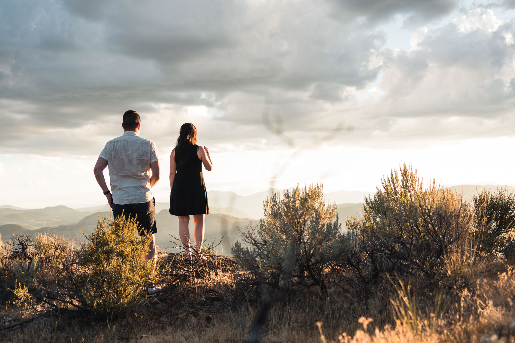 Man proposes with sunset on Anarchist Mountain, Osoyoos