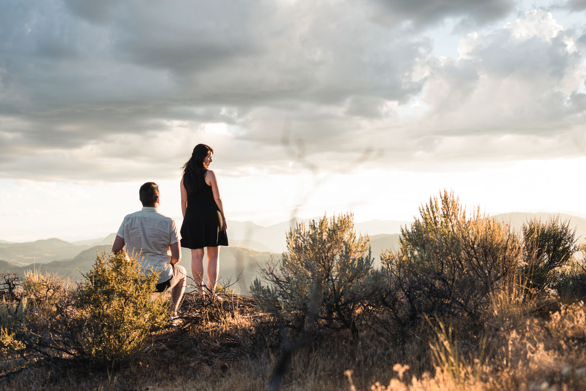 Man proposes with sunset on Anarchist Mountain, Osoyoos