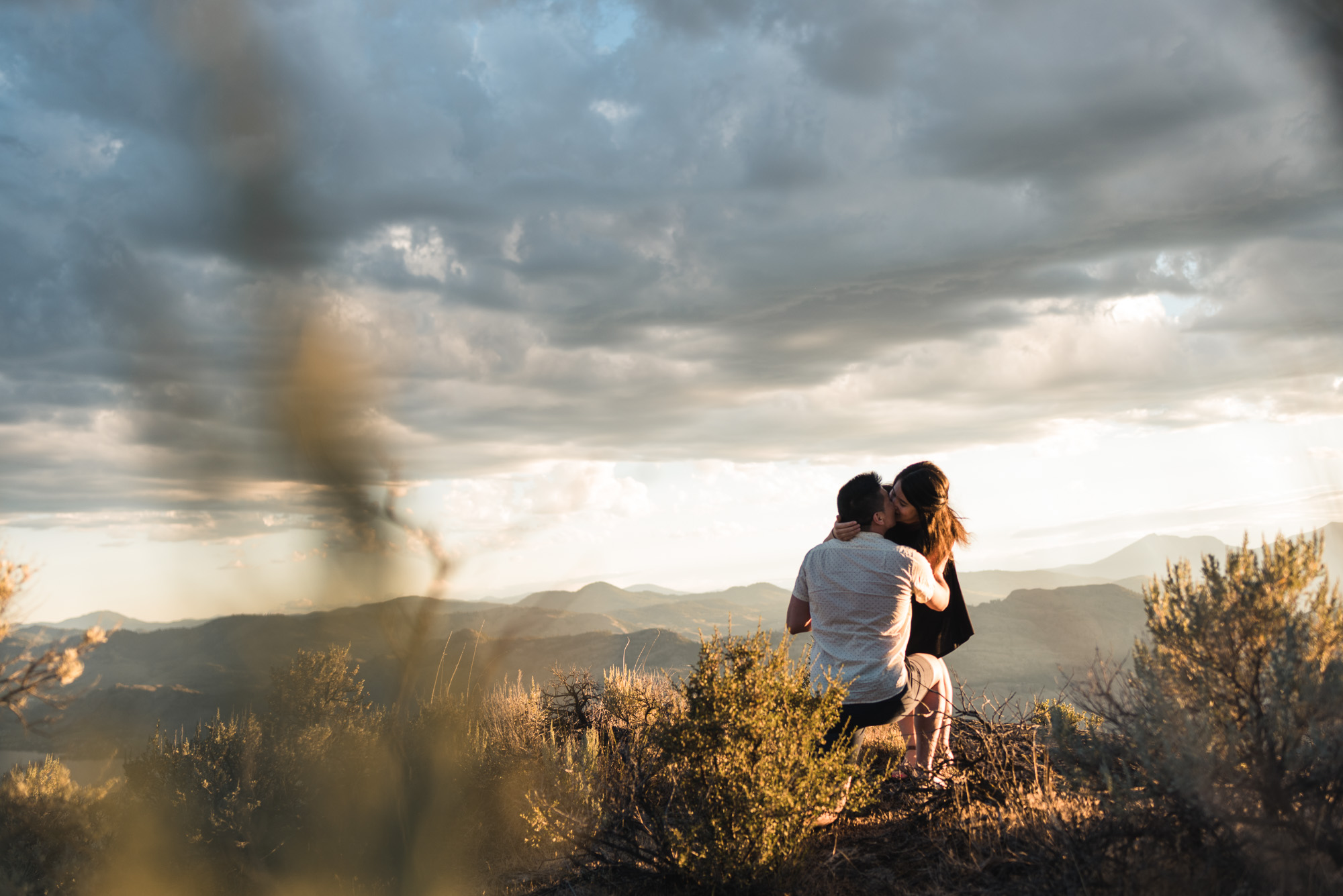 Man proposes with sunset on Anarchist Mountain, Osoyoos