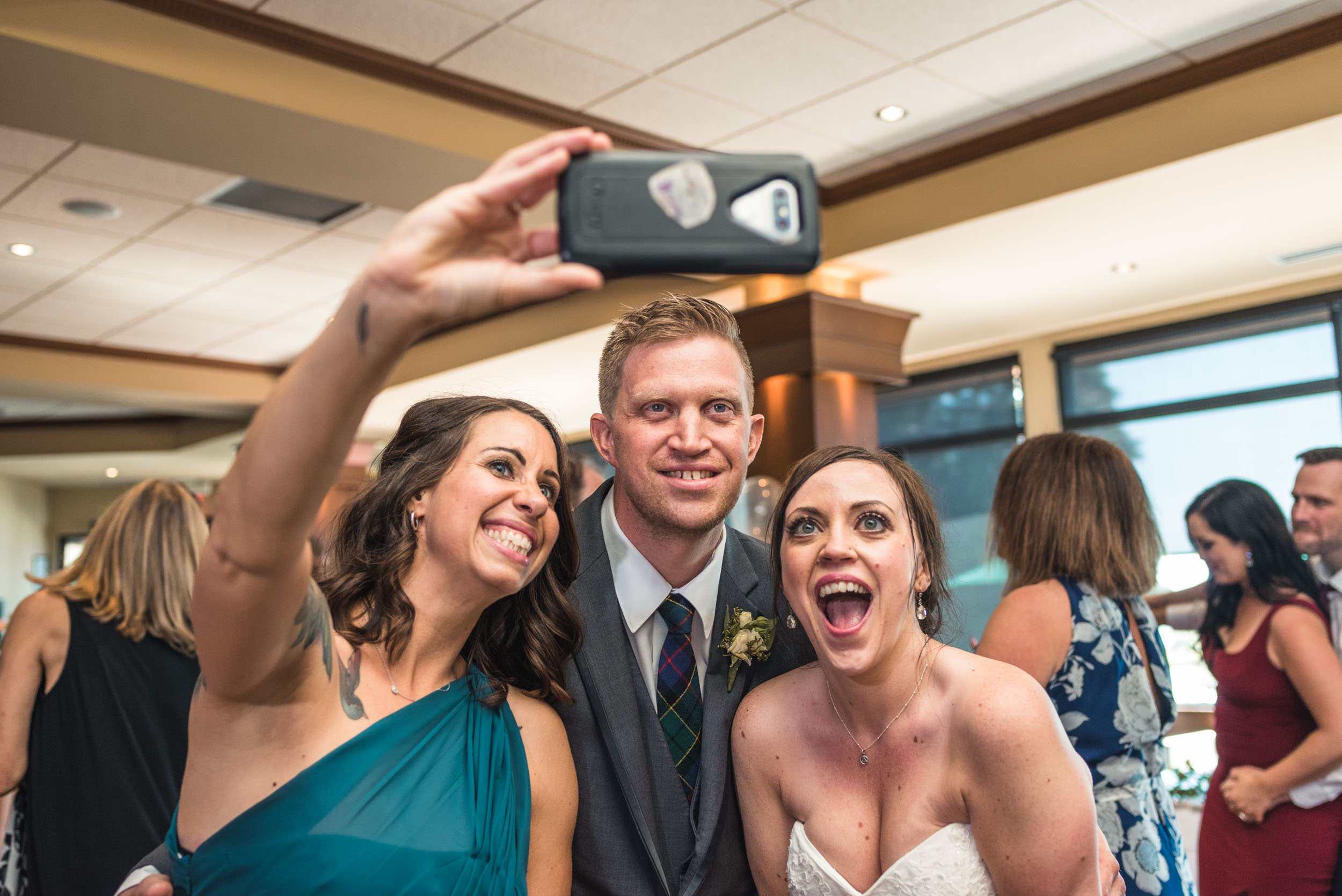 Bride, Groom and Maid of Honour take a selfie