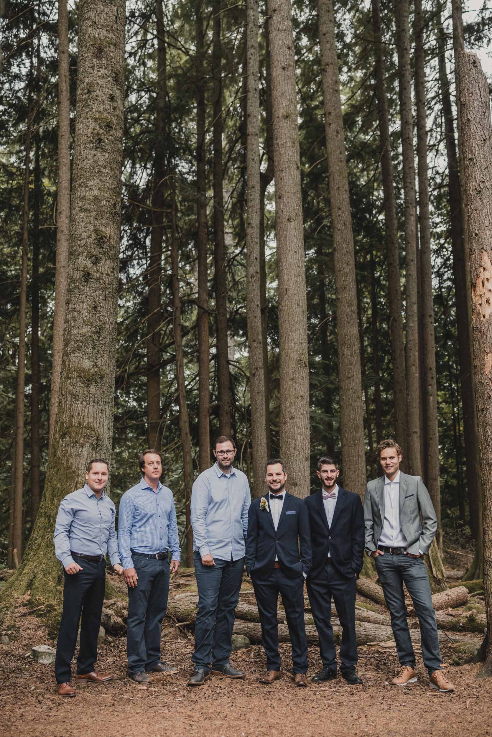 Groom and groomsmen group photo in forest