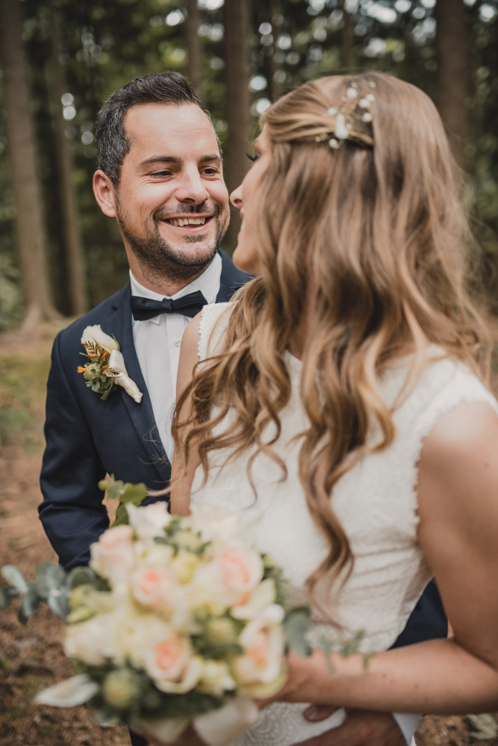 Bride and groom in forest