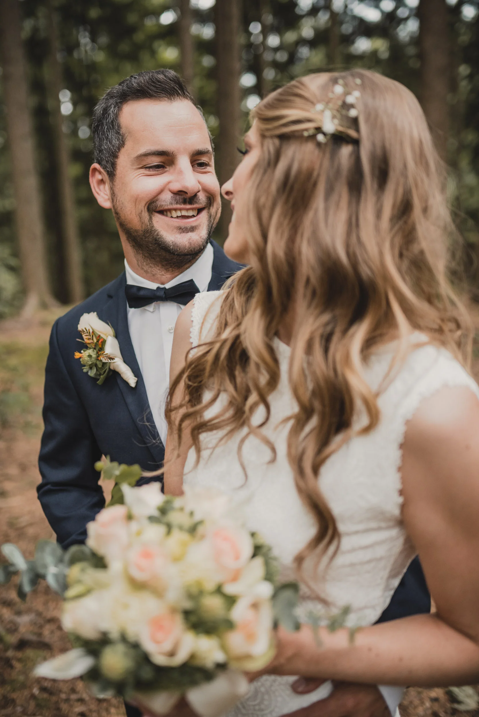 Bride and groom in forest