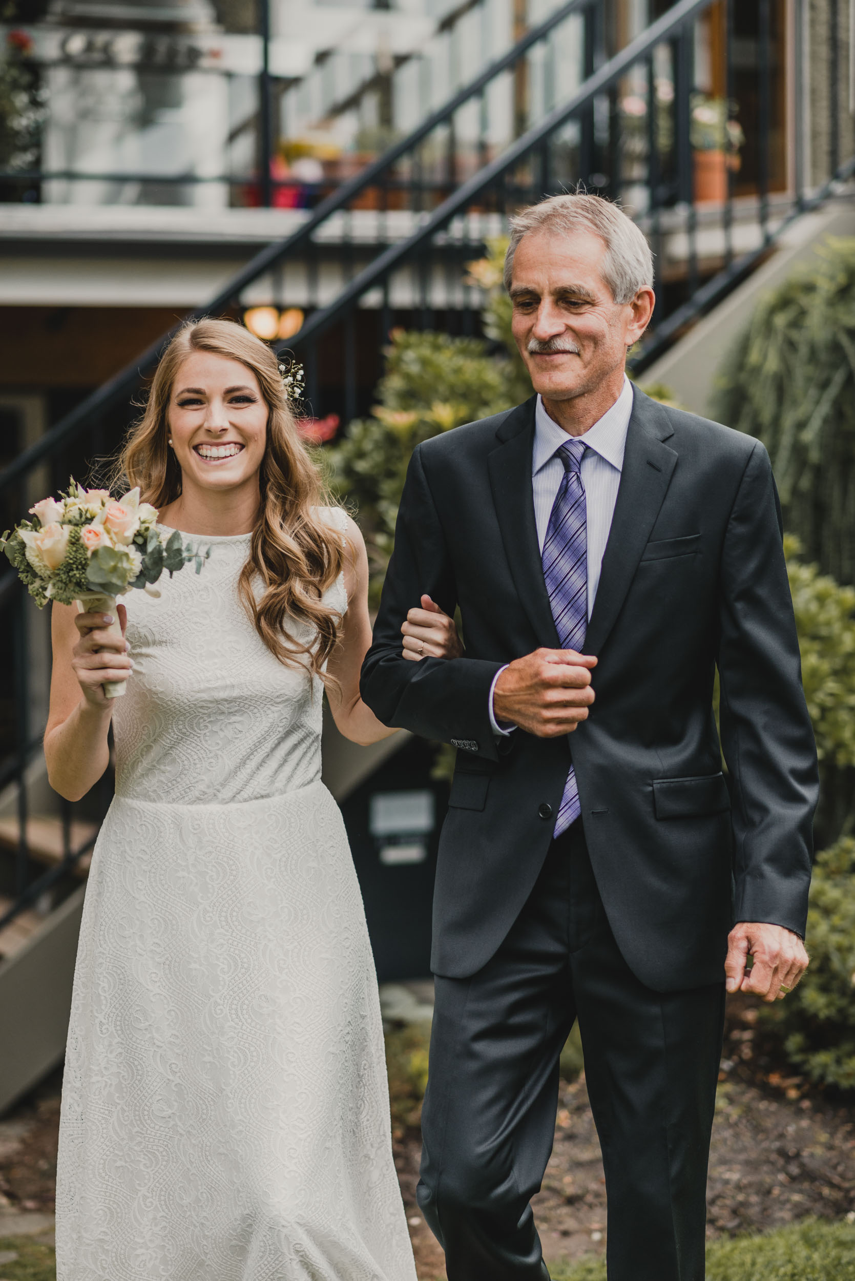 Father of the Bride walks her to altar