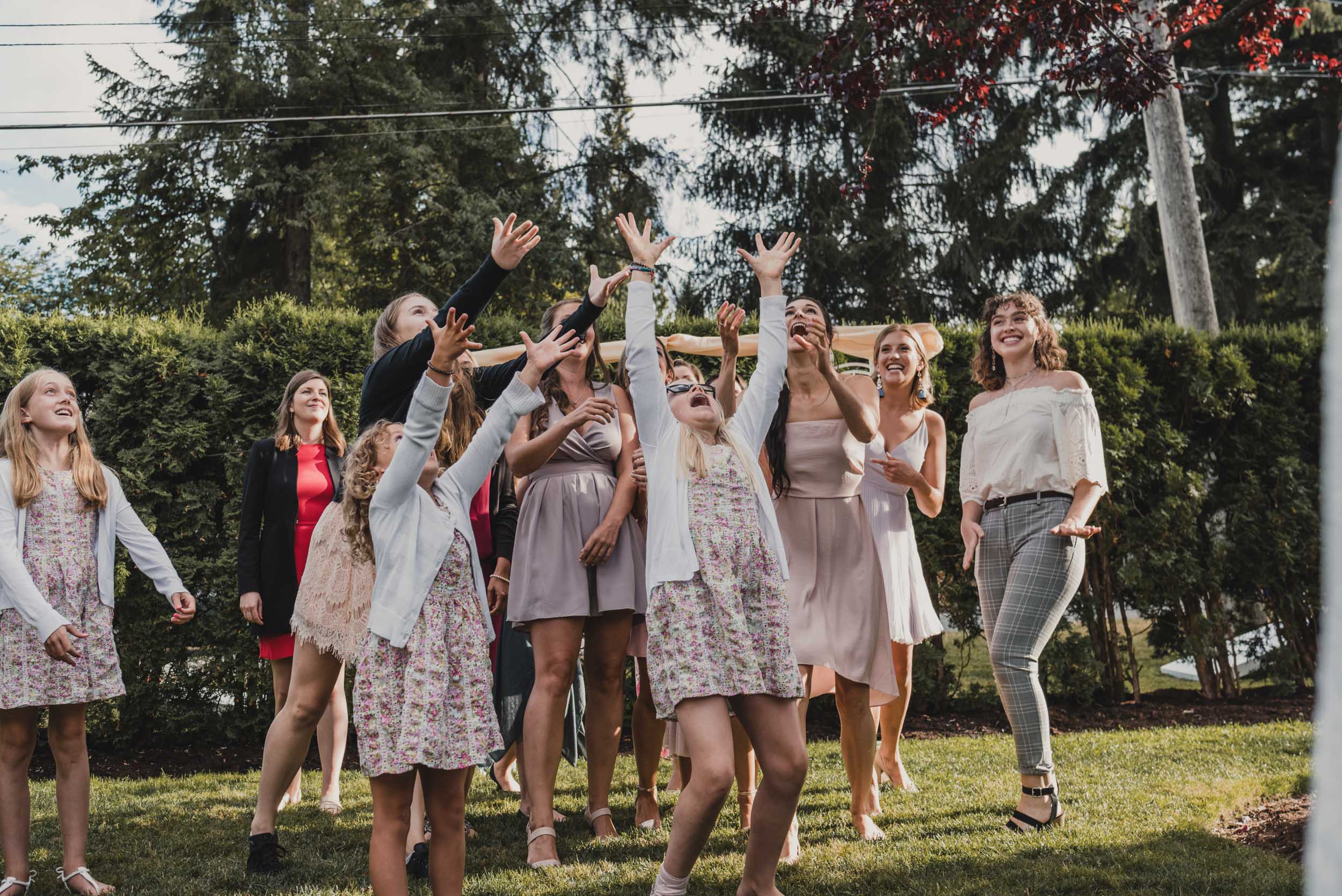 Guest ready for bouquet toss