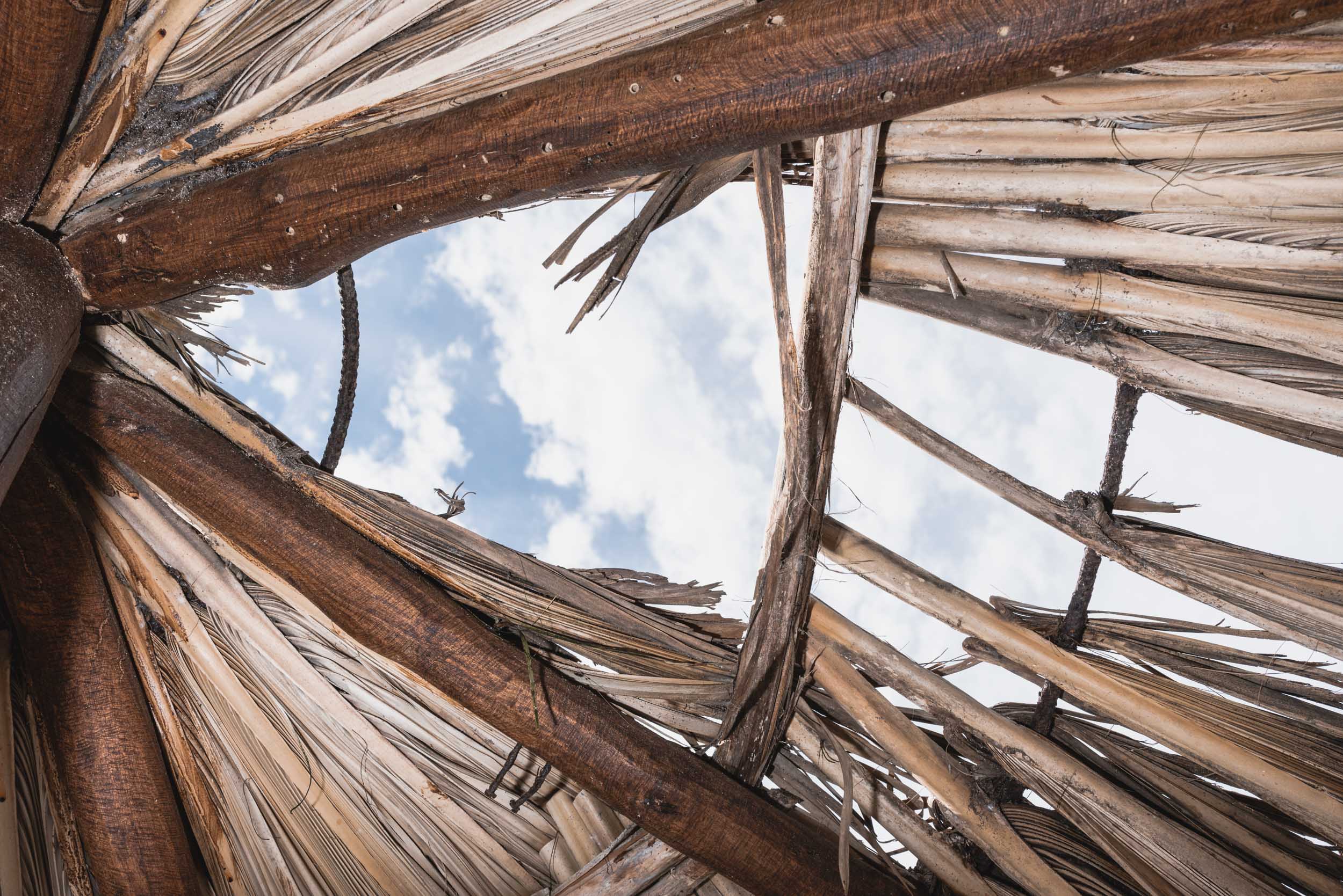 Sky scene through beach palapa