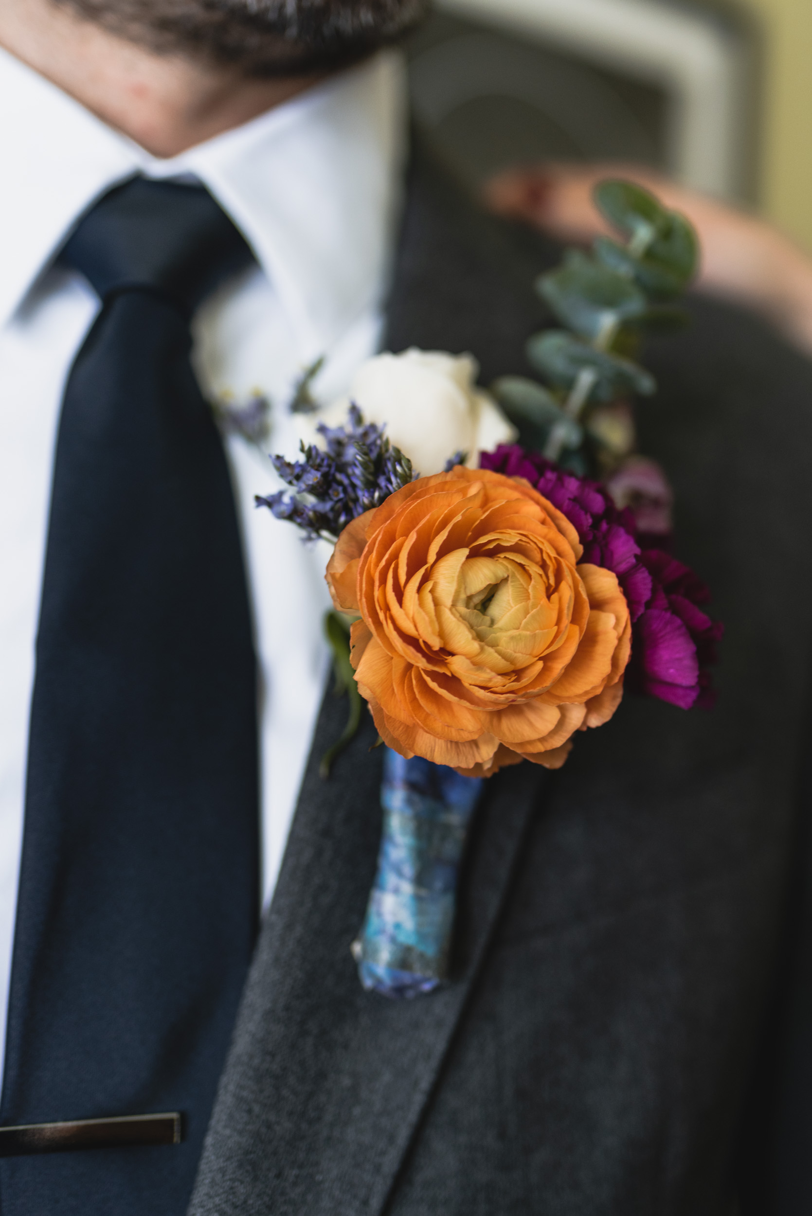 Groom orange boutonnière