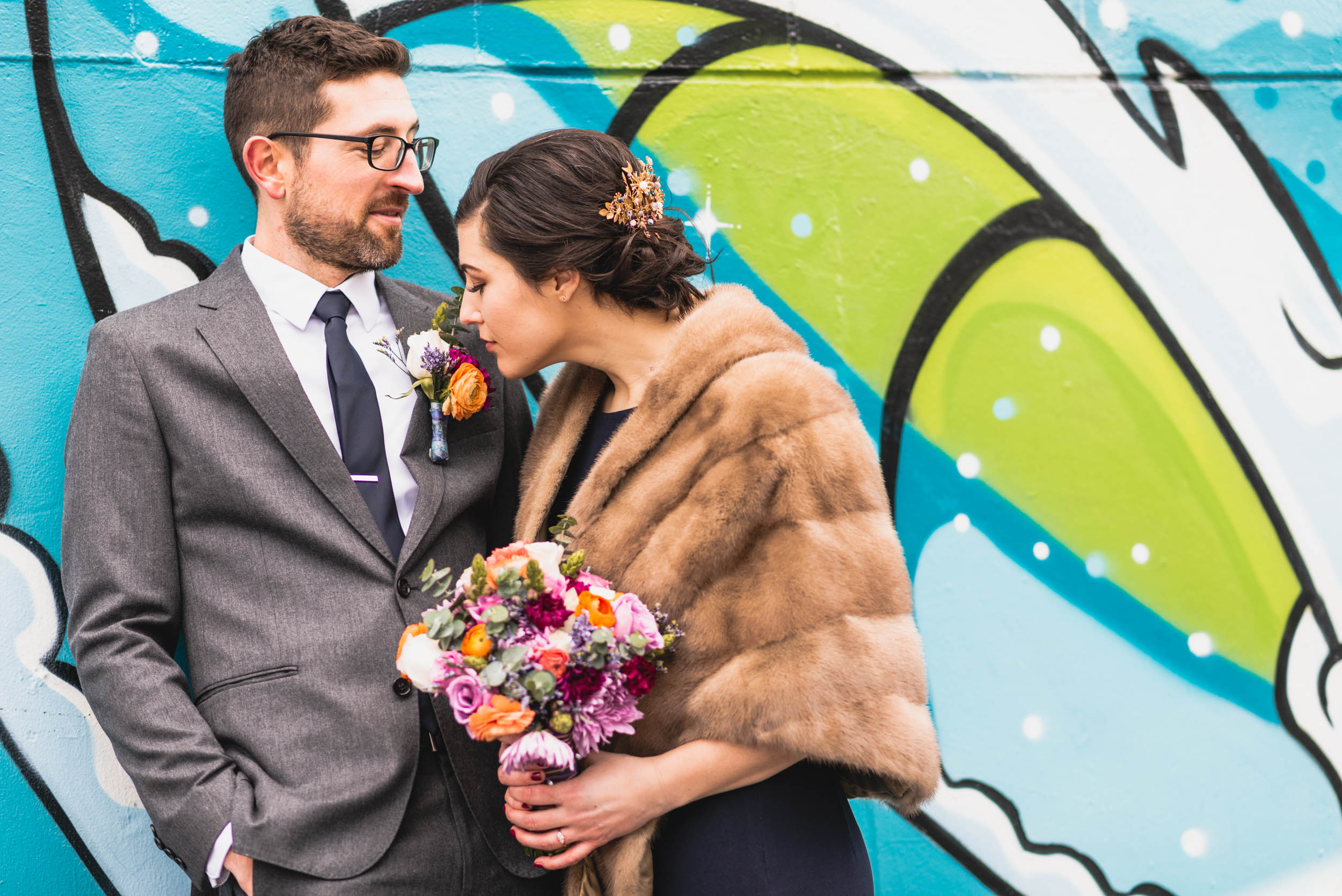 Bride smells Groom's boutonnière 