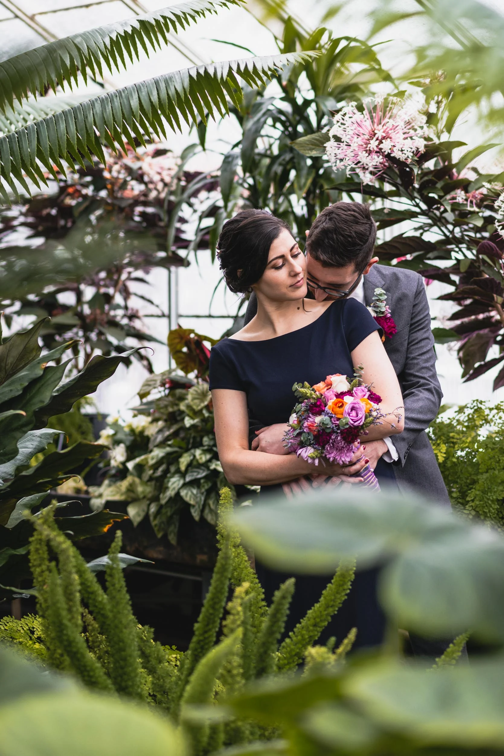 Bride and groom among plants