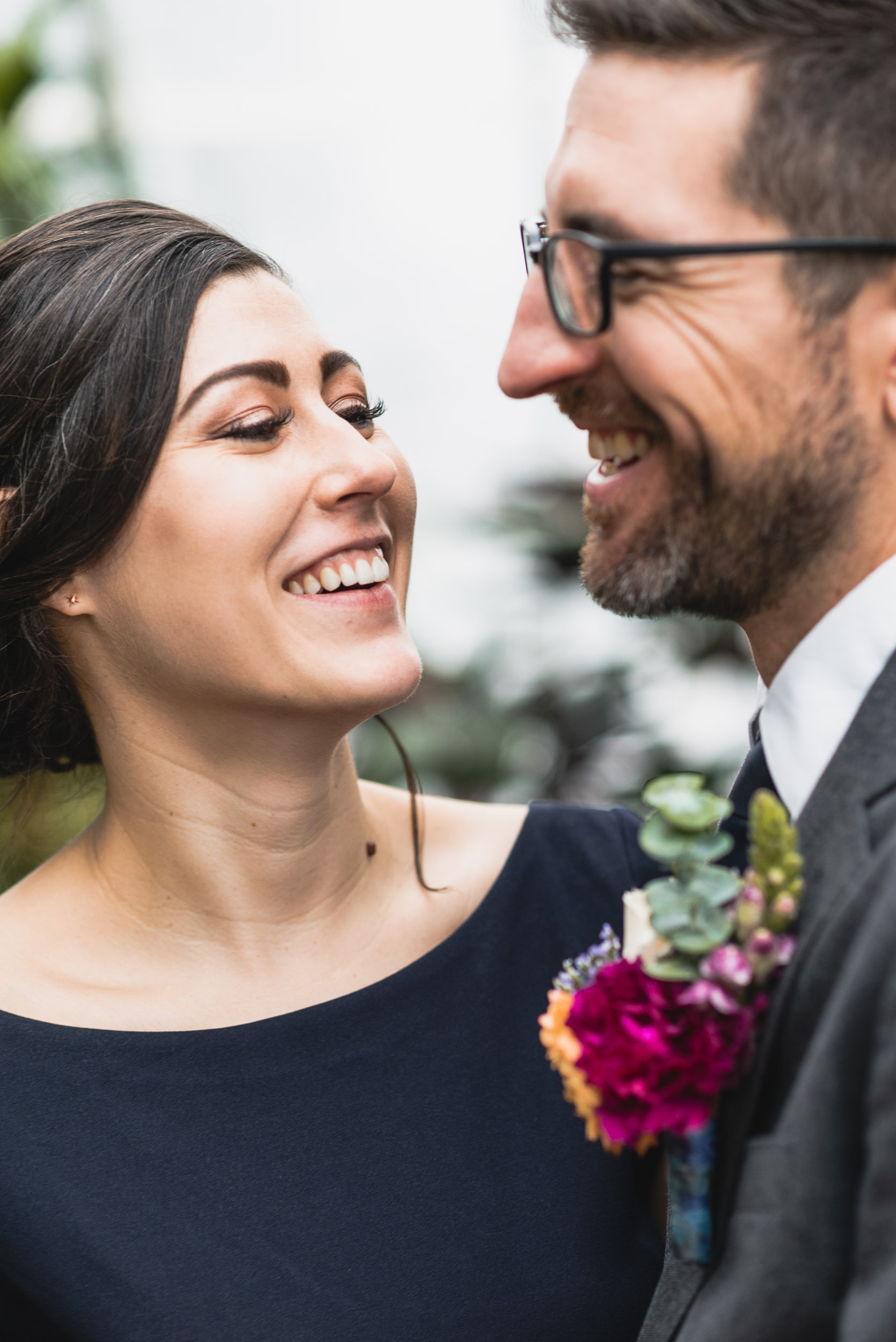 Bride and Groom laugh together