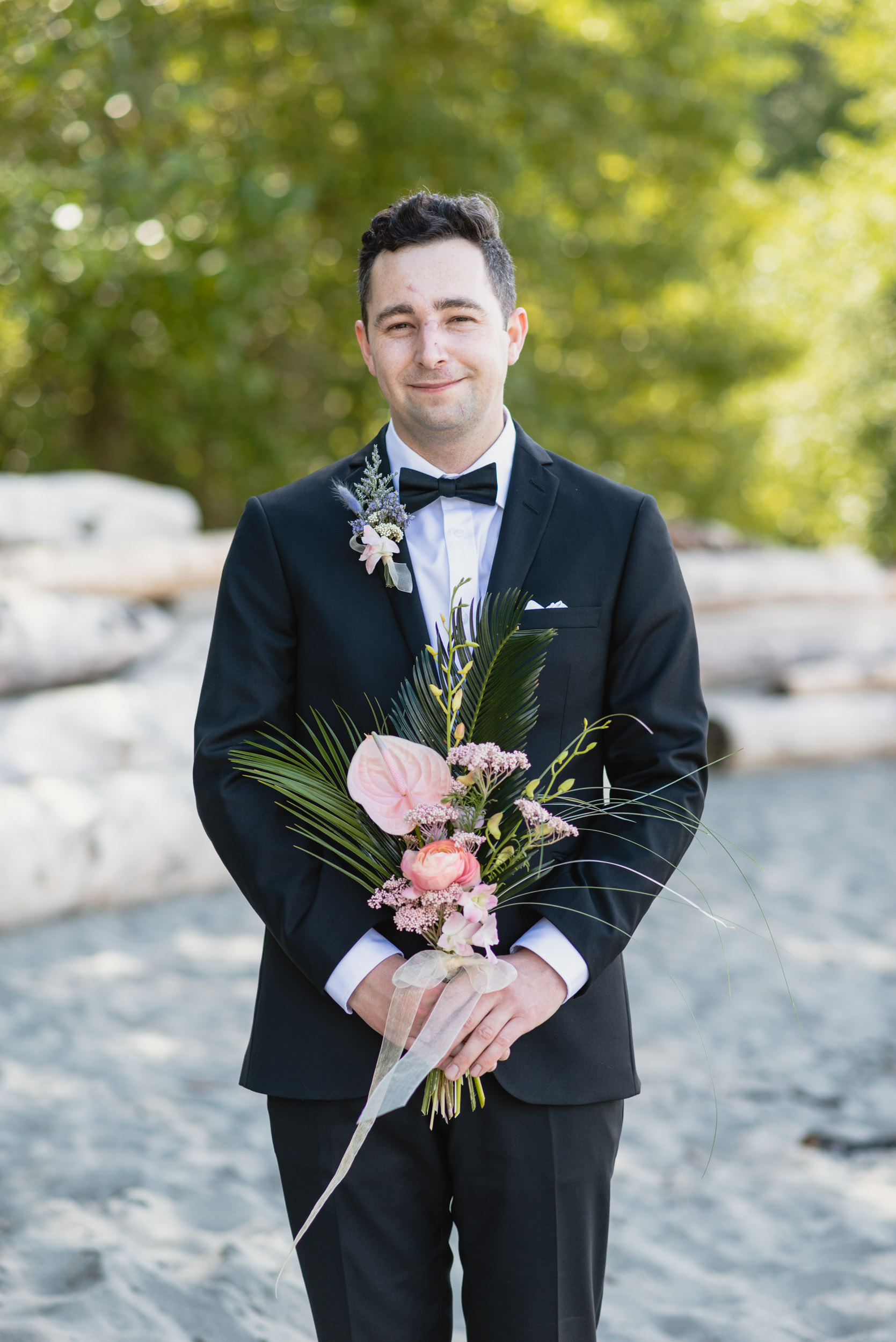 Groom with bouquet