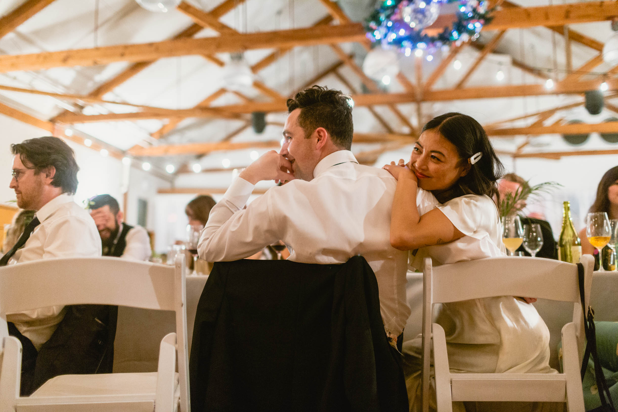 Bride and Groom listening to speeches