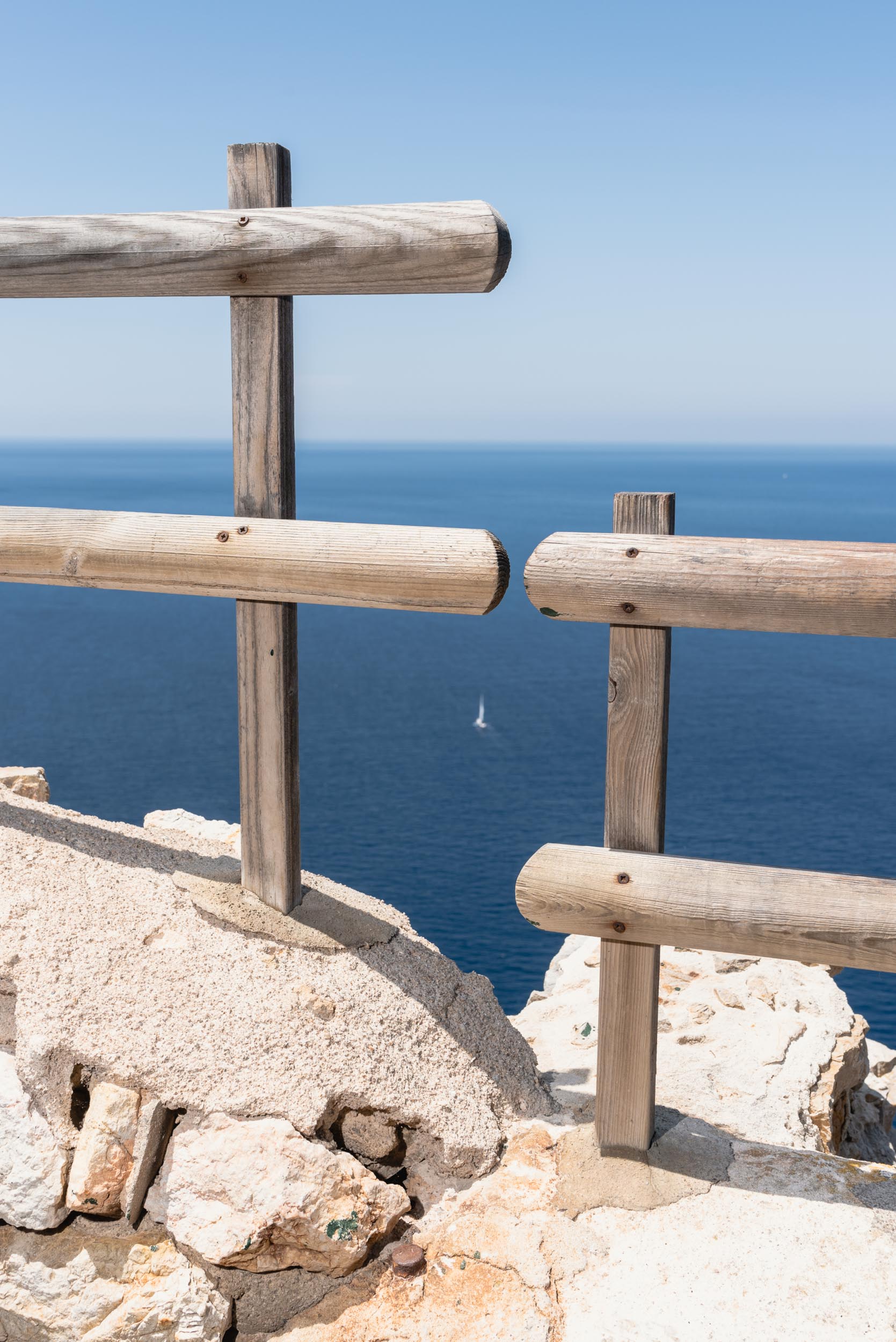 Ocean through railing Cap Formentor