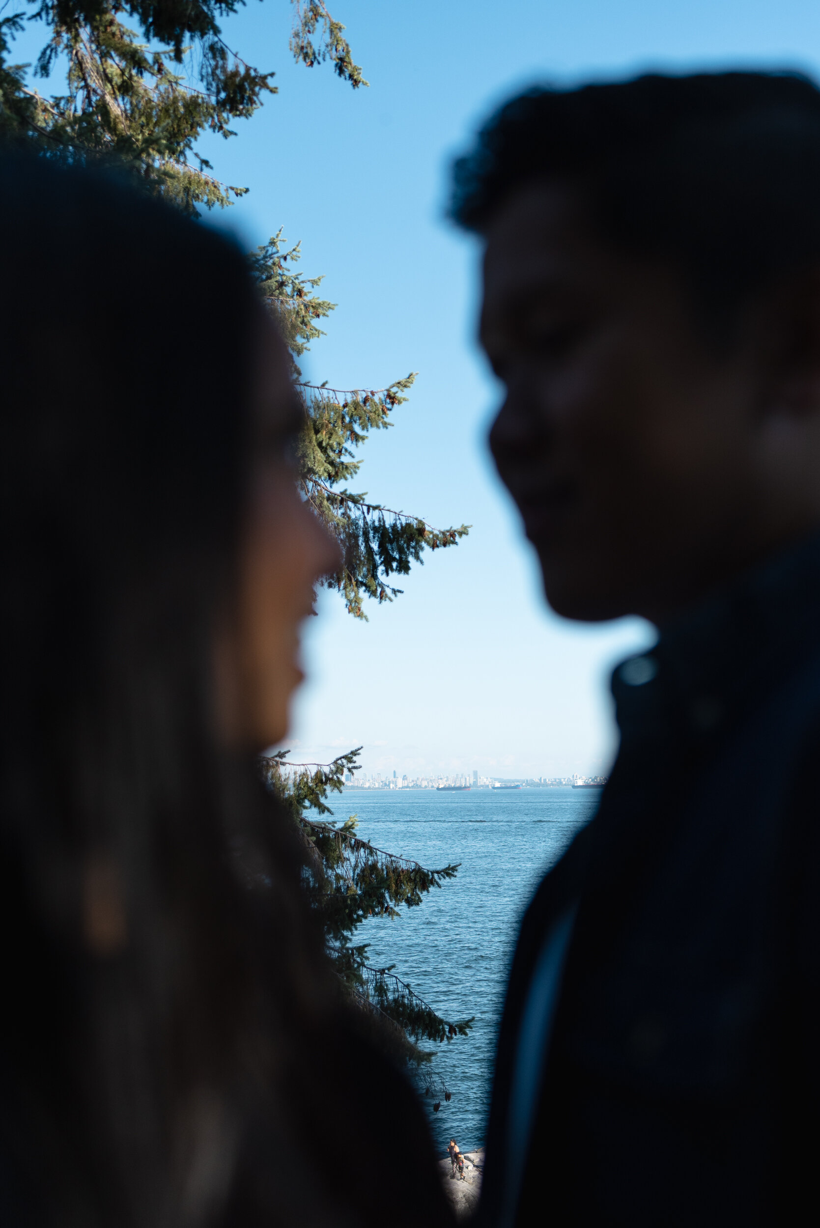 Vancouver in focus between couple's profiles