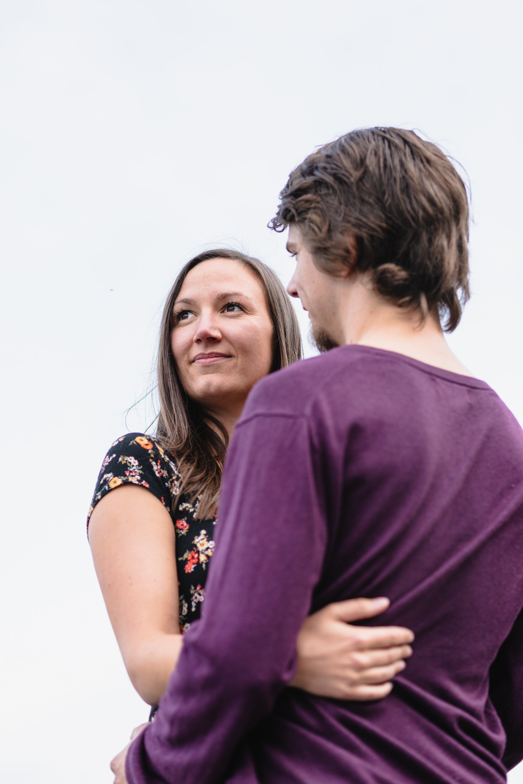 Couple looking off into distance together