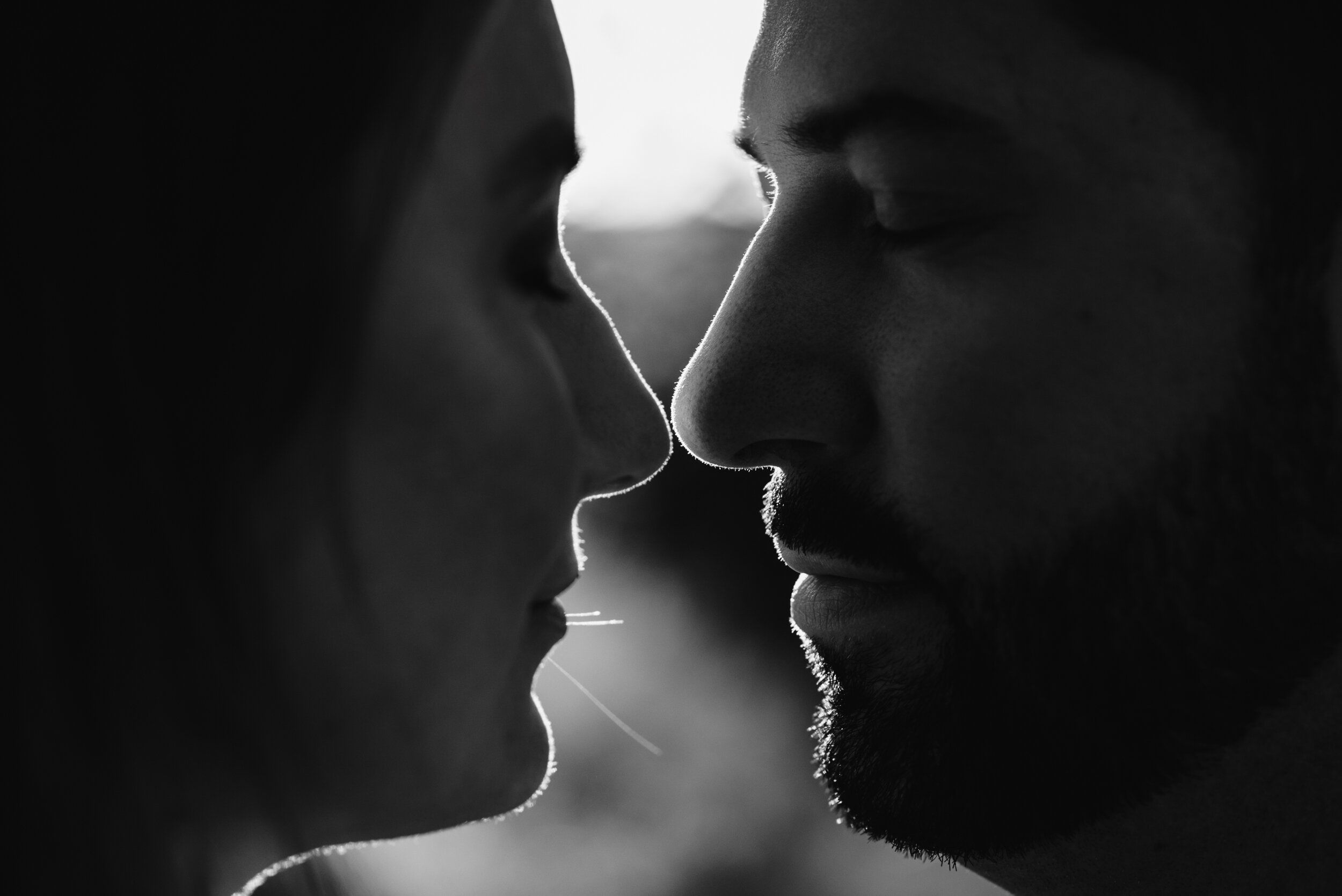 Backlit profile couple black and white