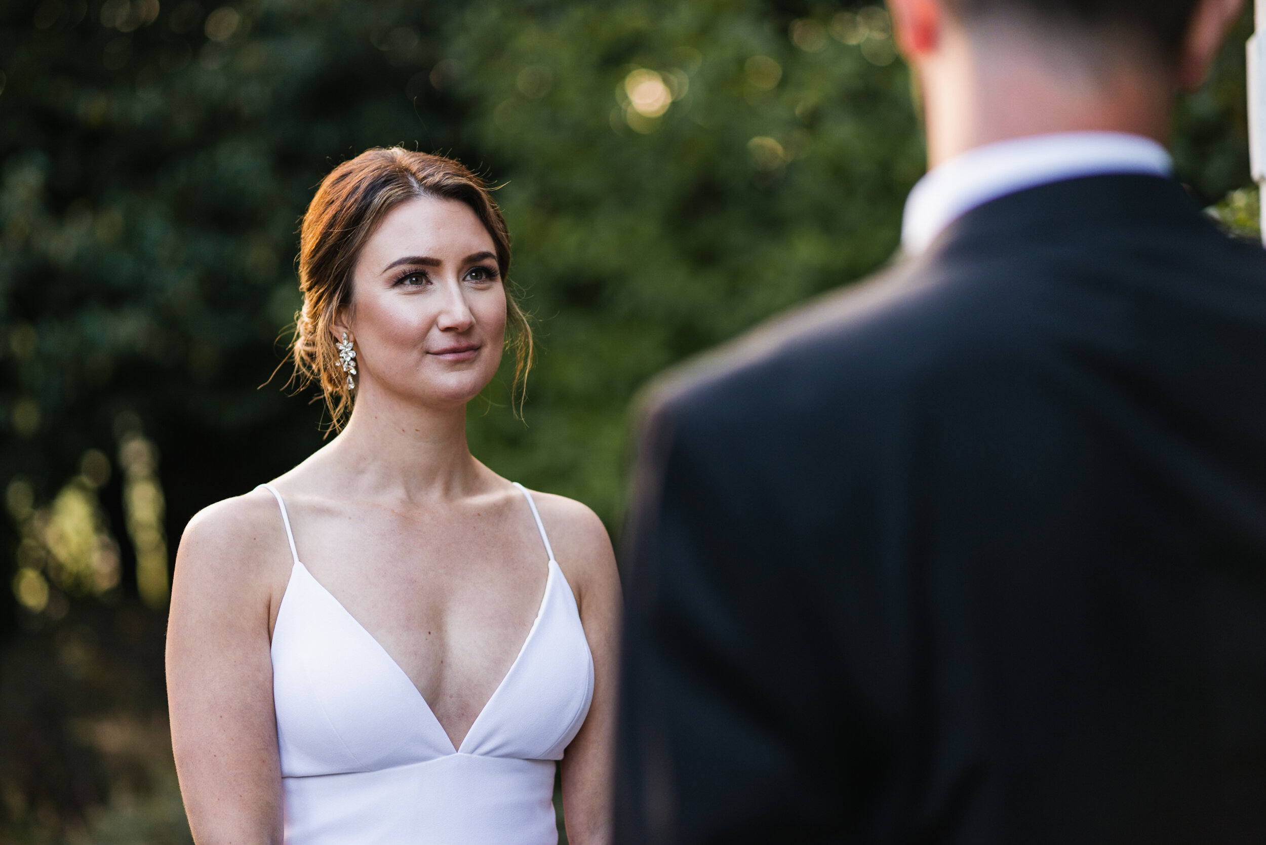 Bride looks at Groom during ceremony