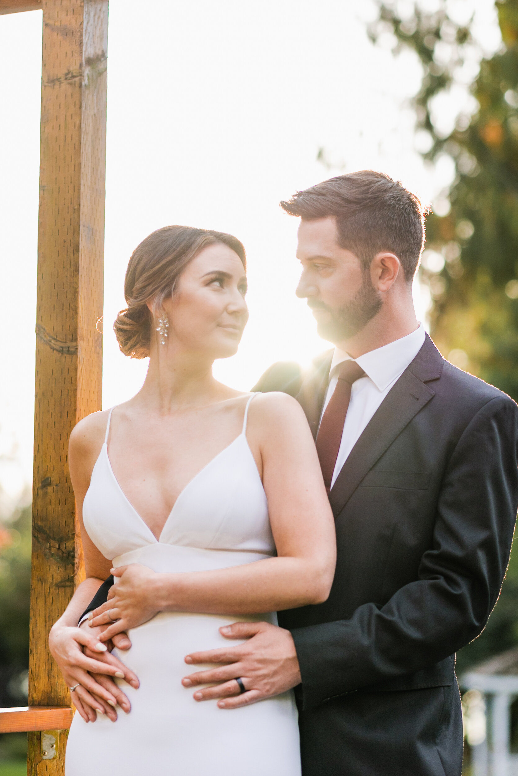 Bride and Groom portrait backlit sunset